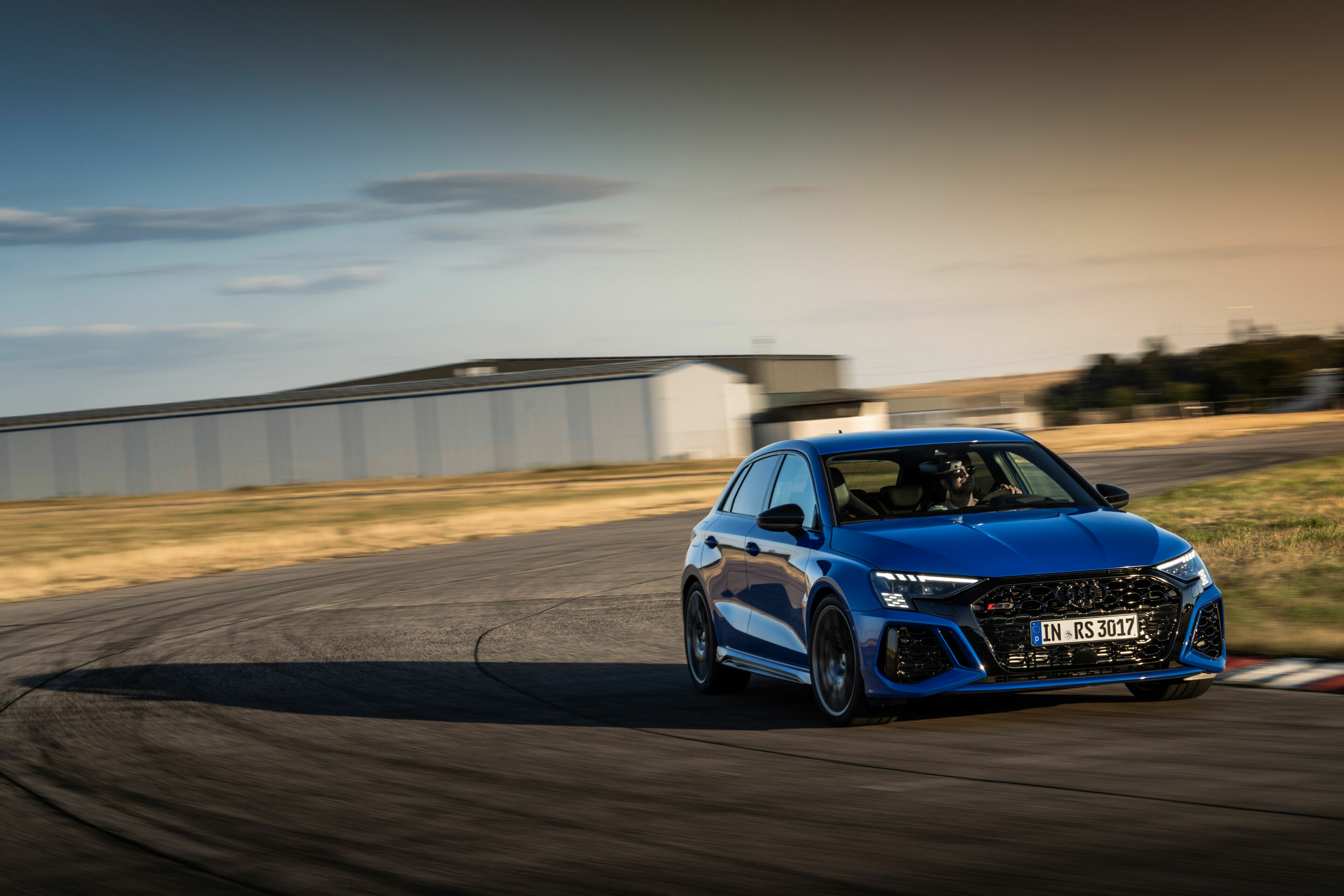 Audi RS 3 Sportback performance edition - Dynamic photo, Colour: Nogaro Blue, Pearl Effect .