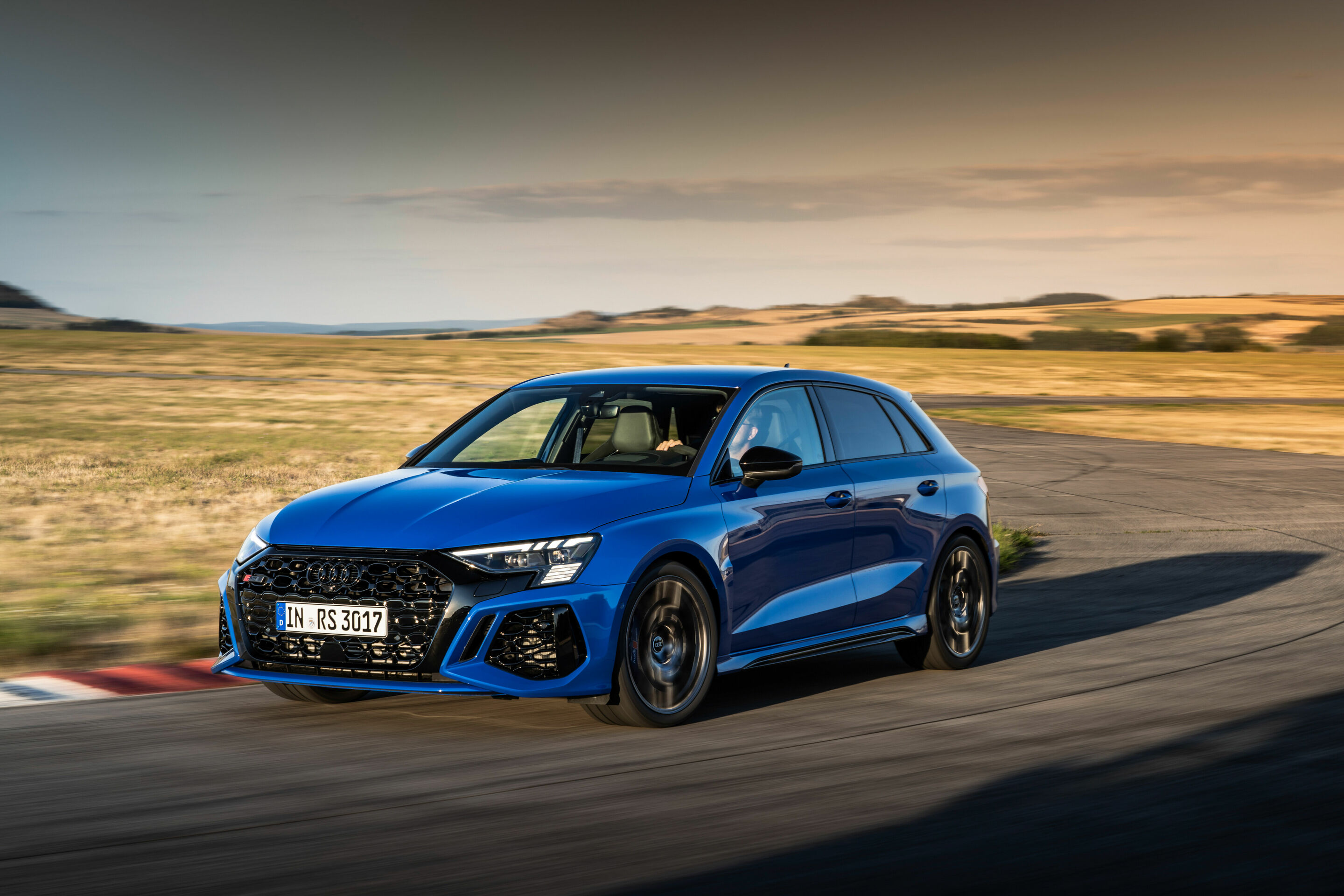 Audi RS 3 Sportback performance edition - Dynamic photo, Colour: Nogaro Blue, Pearl Effect .