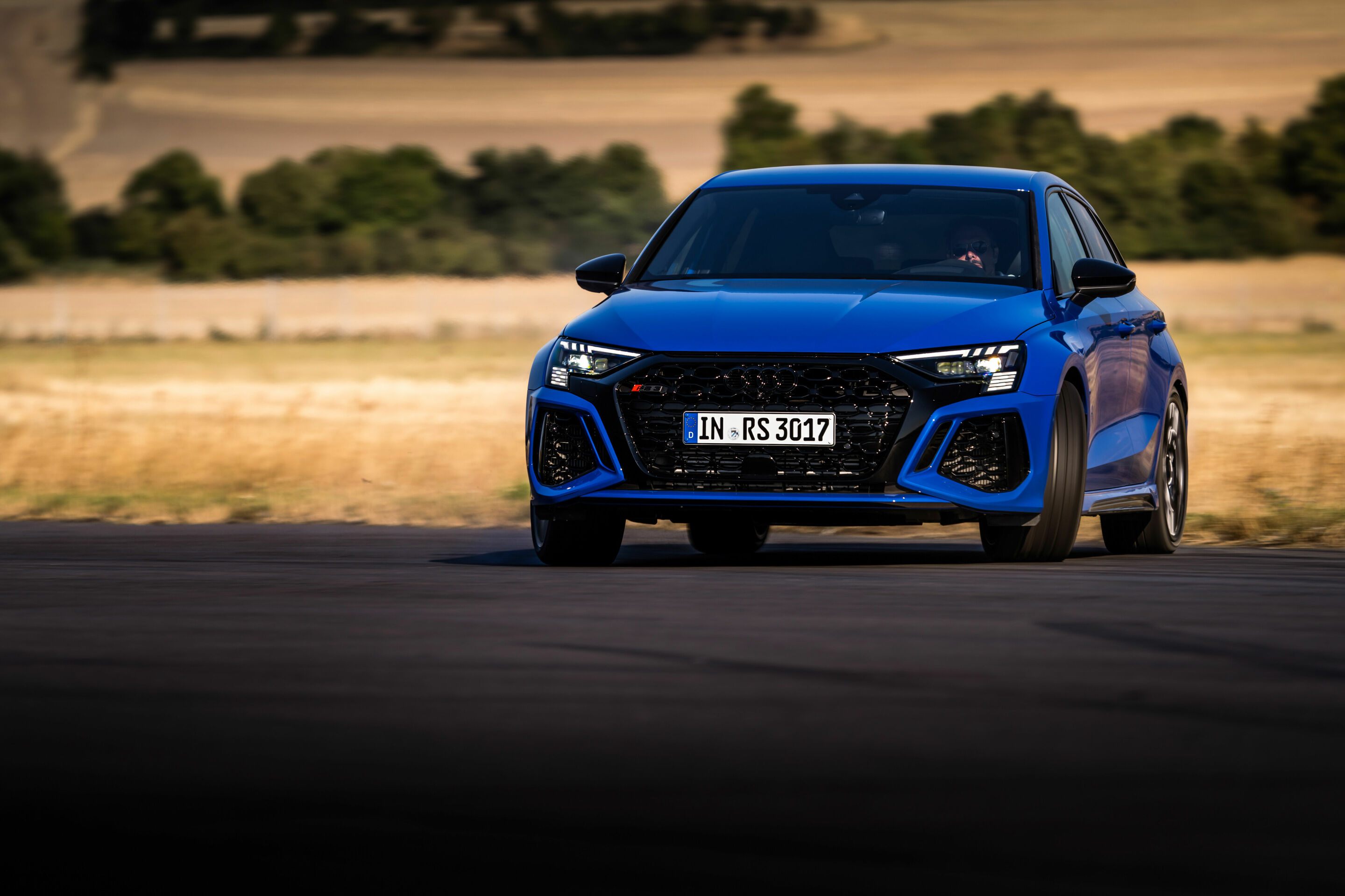 Audi RS 3 Sportback performance edition - Dynamic photo, Colour: Nogaro Blue, Pearl Effect .