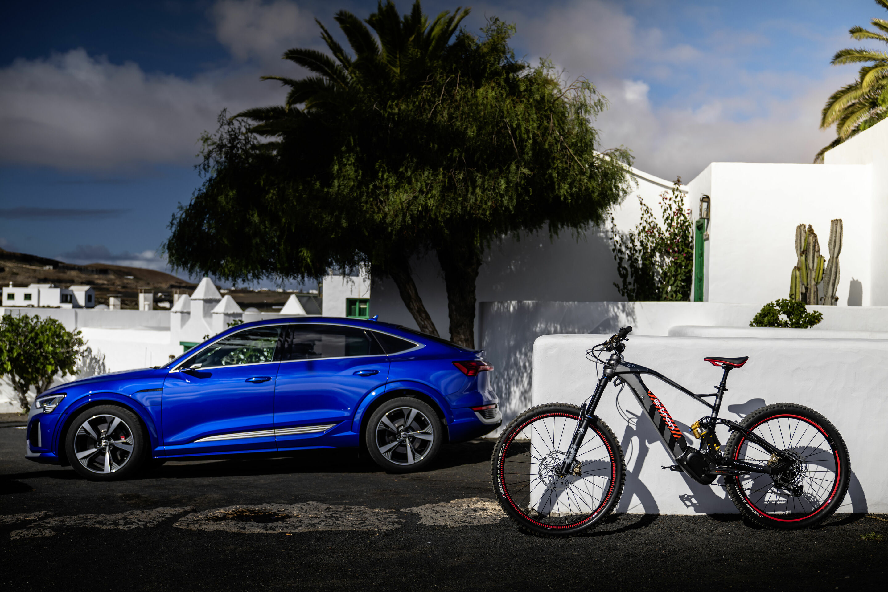 Audi SQ8 Sportback e-tron and Audi electric mountain bike powered by Fantic