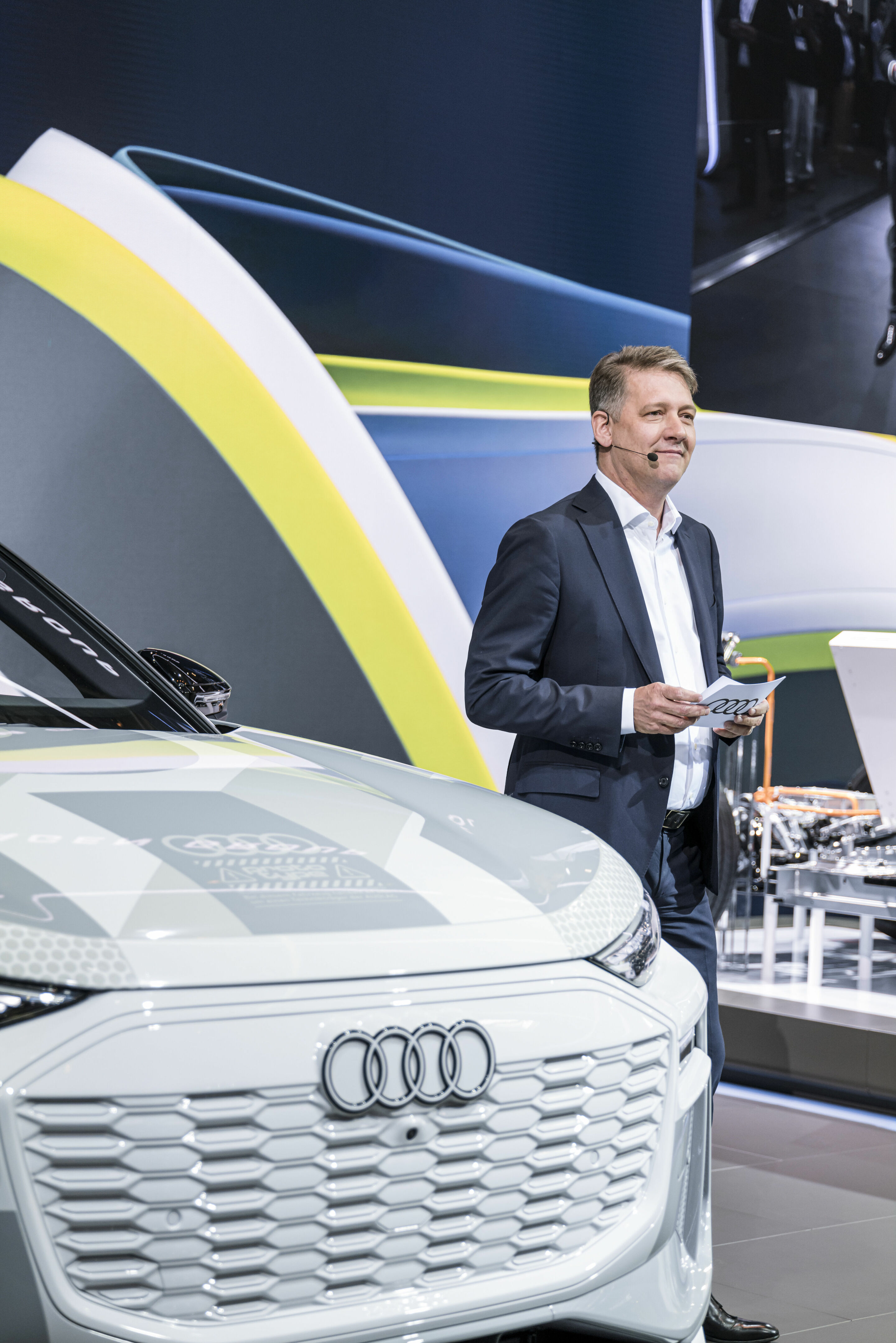 IAA Summit 2023 - Gernot Döllner, Chairman of the Board of Management of AUDI AG, with the masked prototype of the Audi Q6 e-tron