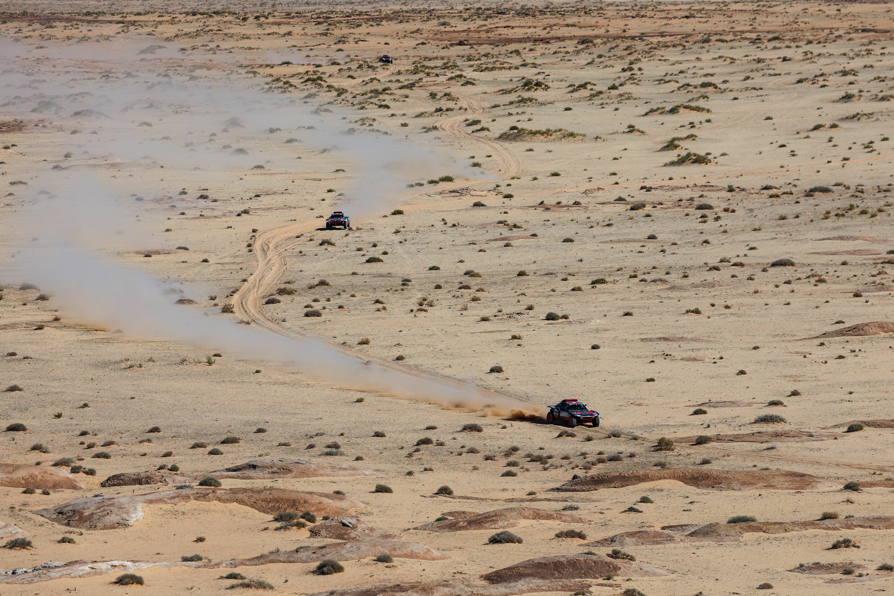 Dakar Rally 2024 - Audi RS Q e-tron #204 (Team Audi Sport), Carlos Sainz/Lucas Cruz; Audi RS Q e-tron #202 (Team Audi Sport), Stéphane Peterhansel/Edouard Boulanger; Audi RS Q e-tron #207 (Team Audi Sport), Mattias Ekström/Emil Bergkvist