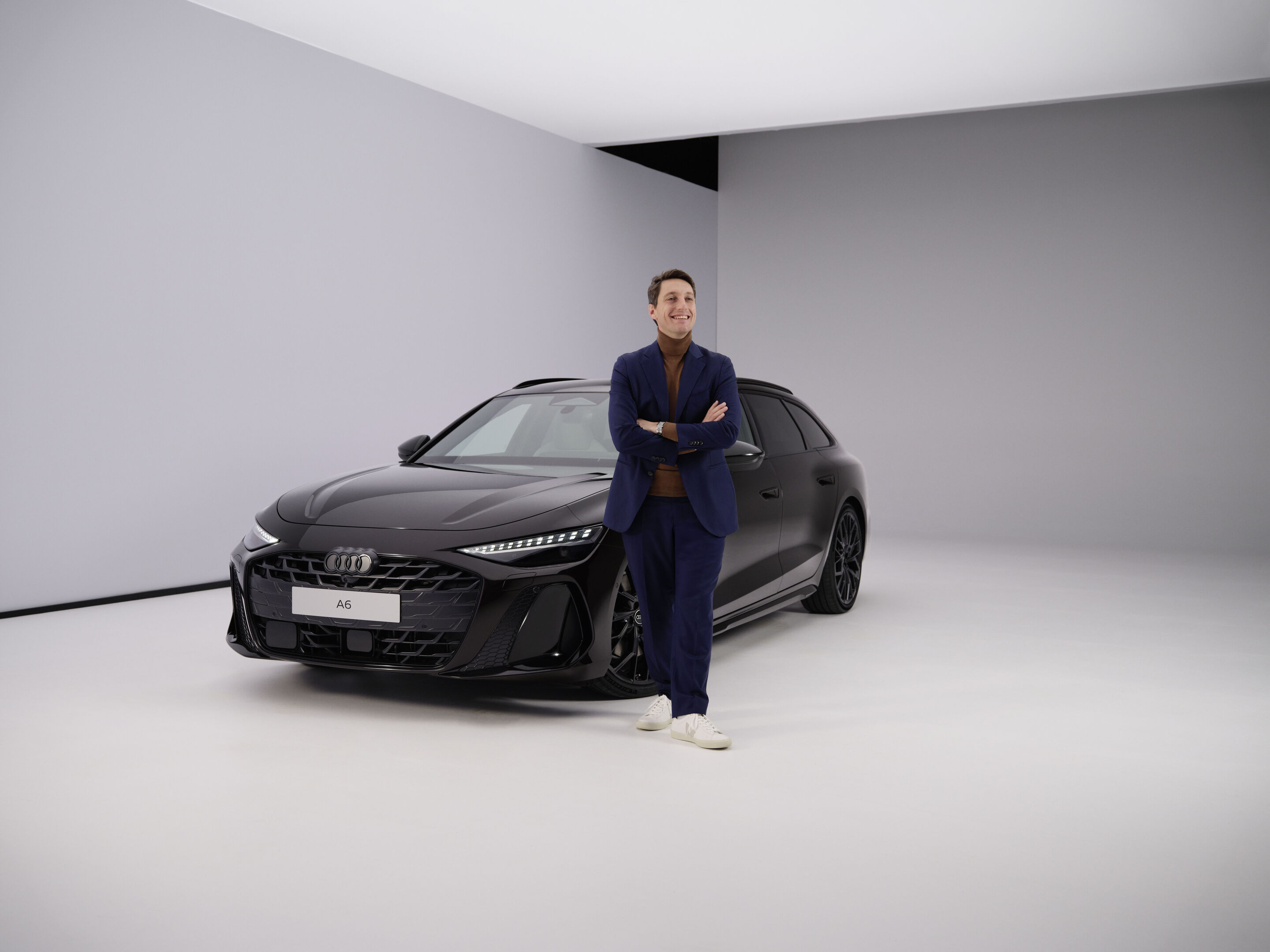 Audi A6 Avant - Geoffrey Bouquot, Member of the Board of Management at AUDI AG for Technical Development, next to the Audi A6 Avant