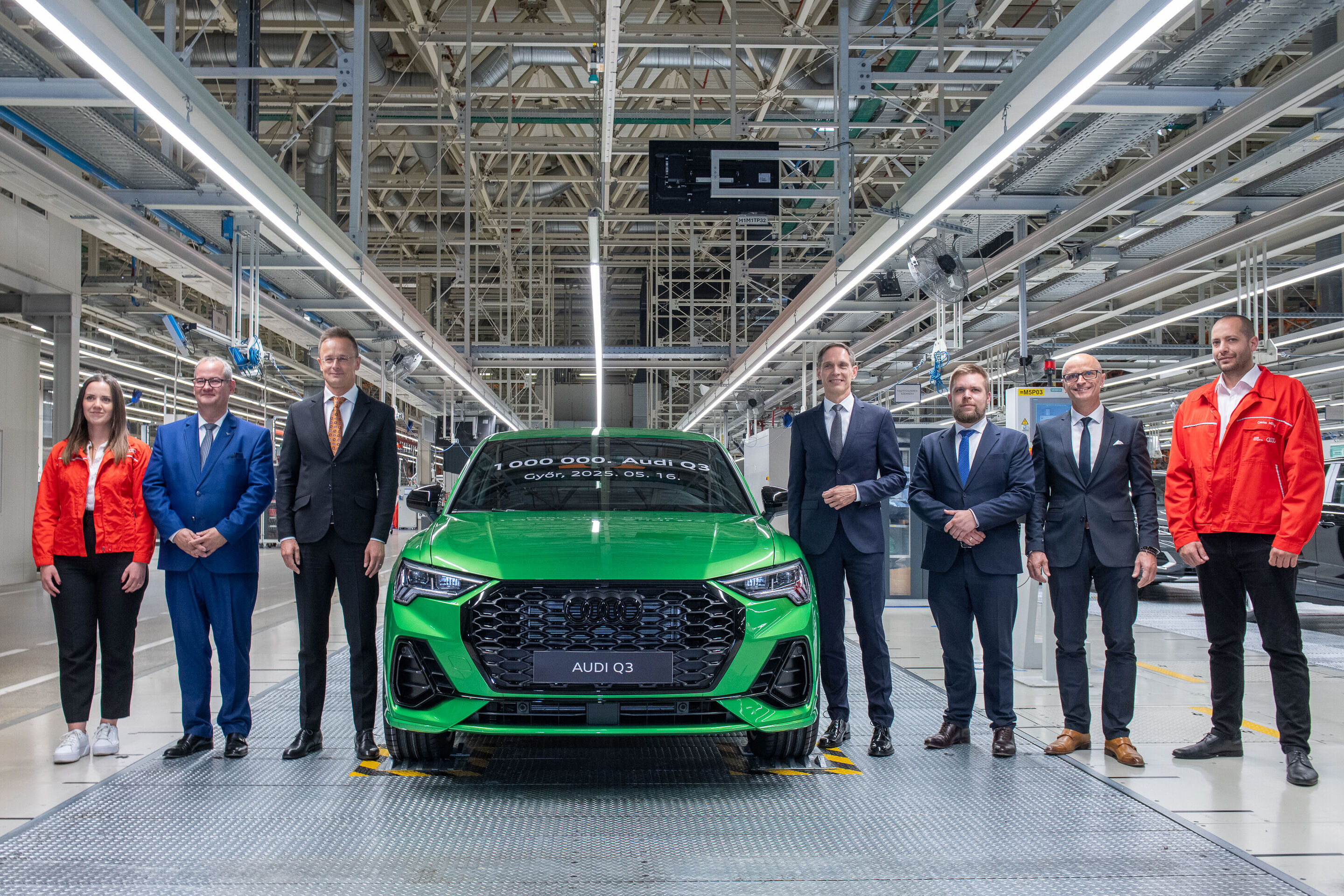 One millionth Audi Q3 made in Győr - Gyöngyvér Vizl (Audi Hungaria employee), Michael Breme (Chairman of the Board of Management of Audi Hungaria), Péter Szijjártó (Minister of Foreign Affairs and Trade), Gerd Walker (Chairman of the Supervisory Board...