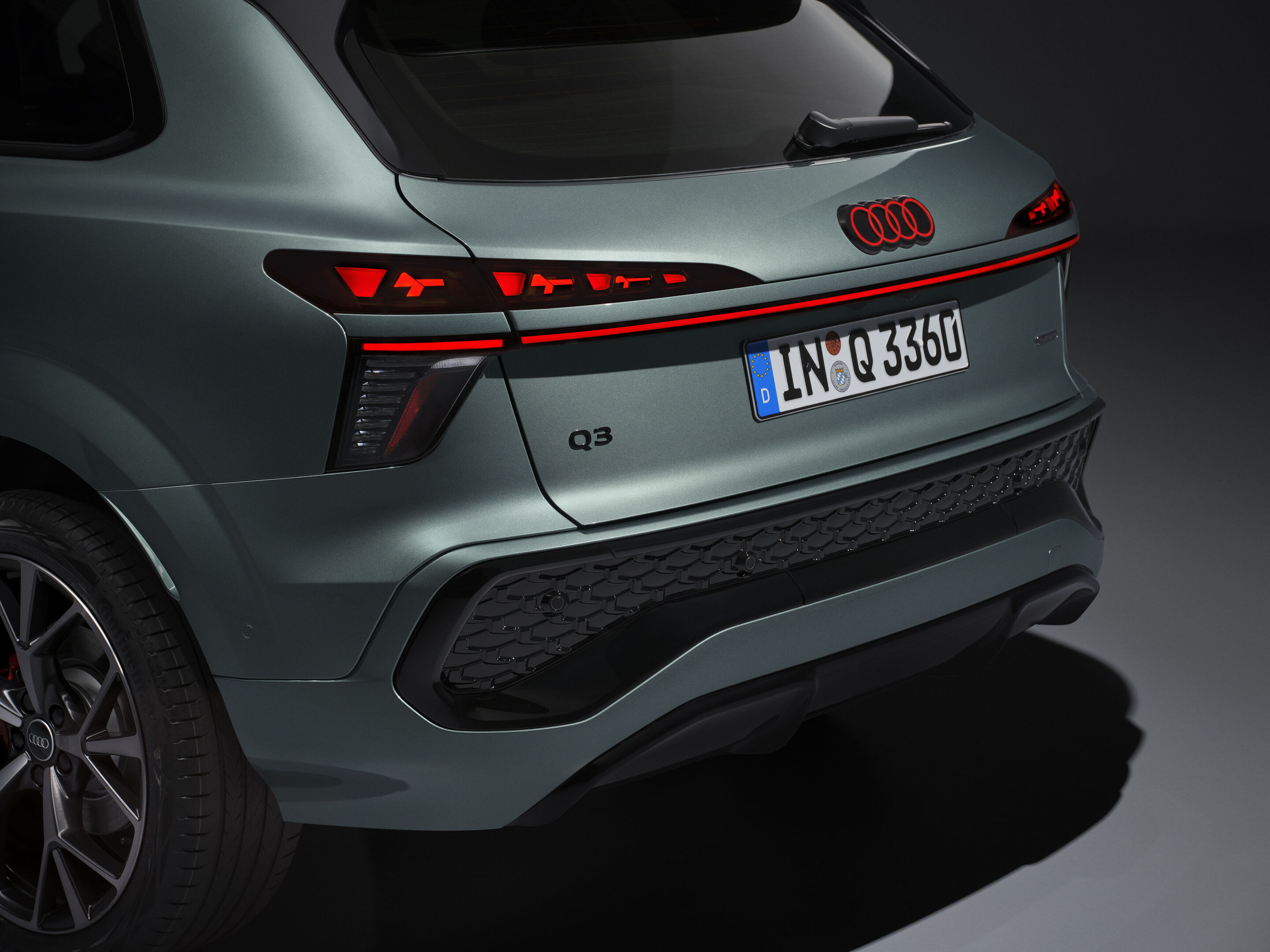 Audi Q3 SUV - Detail (Logo illumination is only active while headlights are on low beam or high beam),
Colour: Sage green