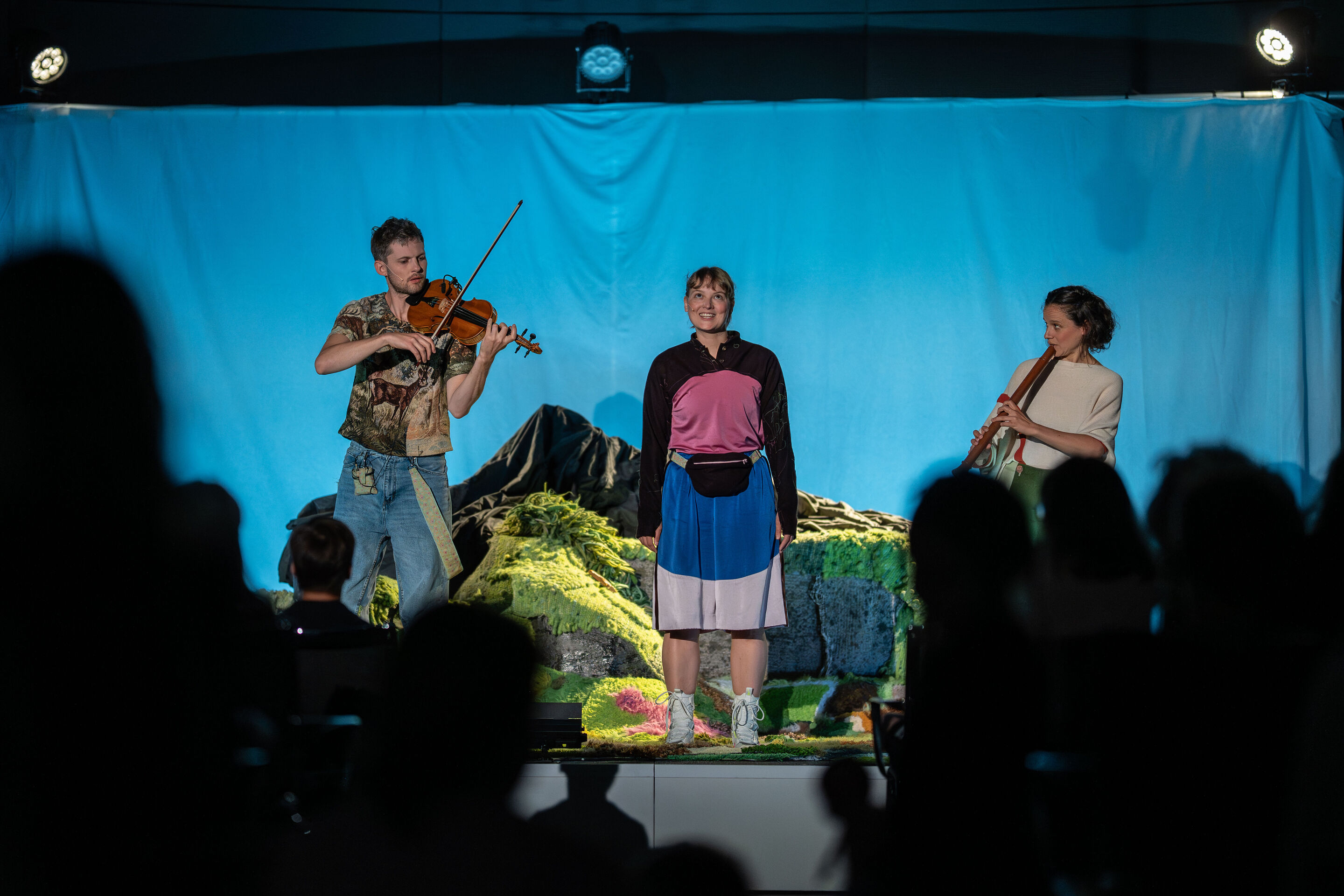 The Salzburg Festival presents: “Berge flüstern laut” – musical theater for children - From the audience's point of view: Franca Luisa Burandt, Matteo Haitzmann and Anne-Suse Enßle of the Salzburg Festival on the stage of the cinema in the Audi museum...