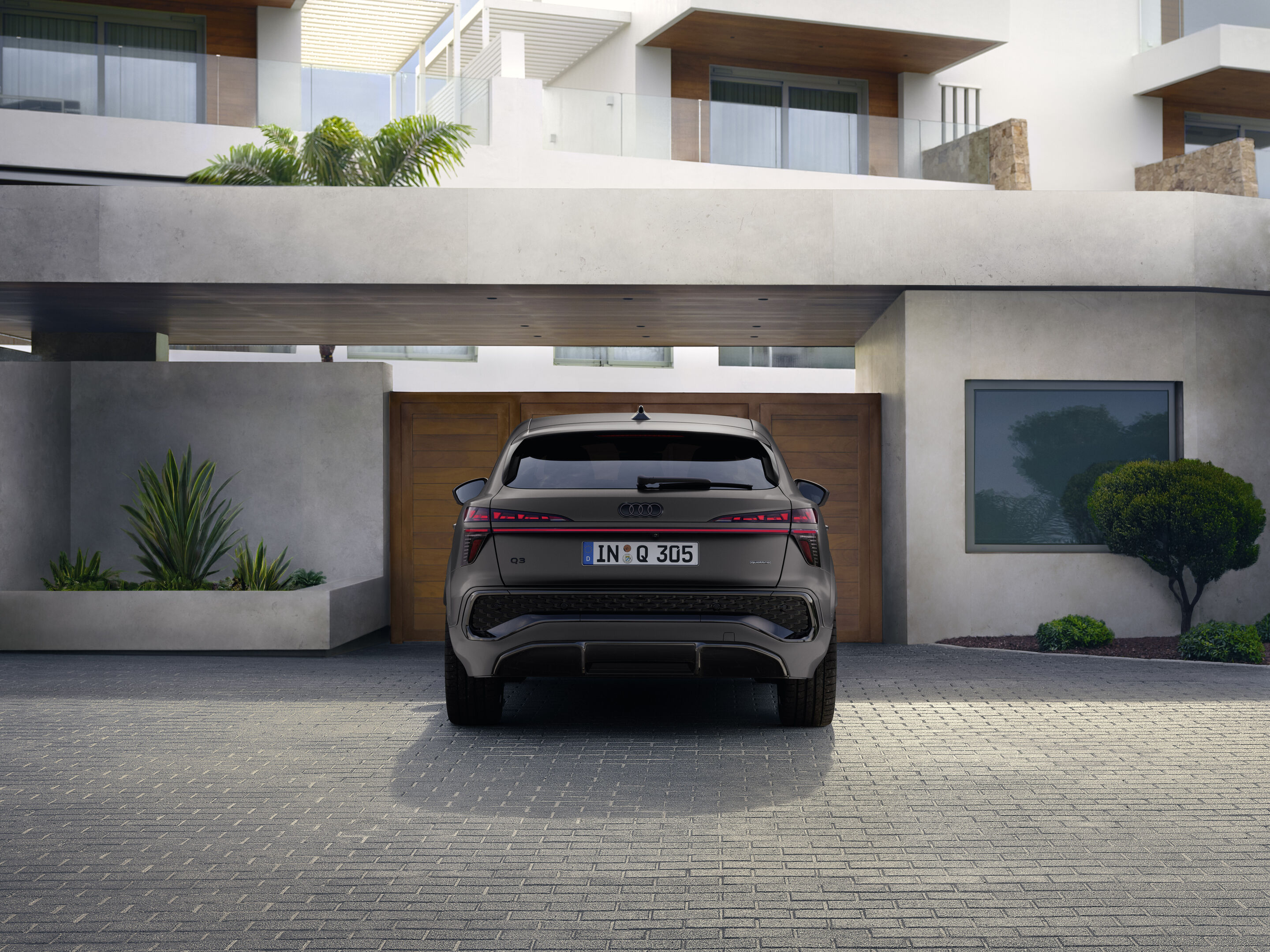 Audi Q3 Sportback - Madeira brown metallic, static outdoor-shot, exterior, rear view