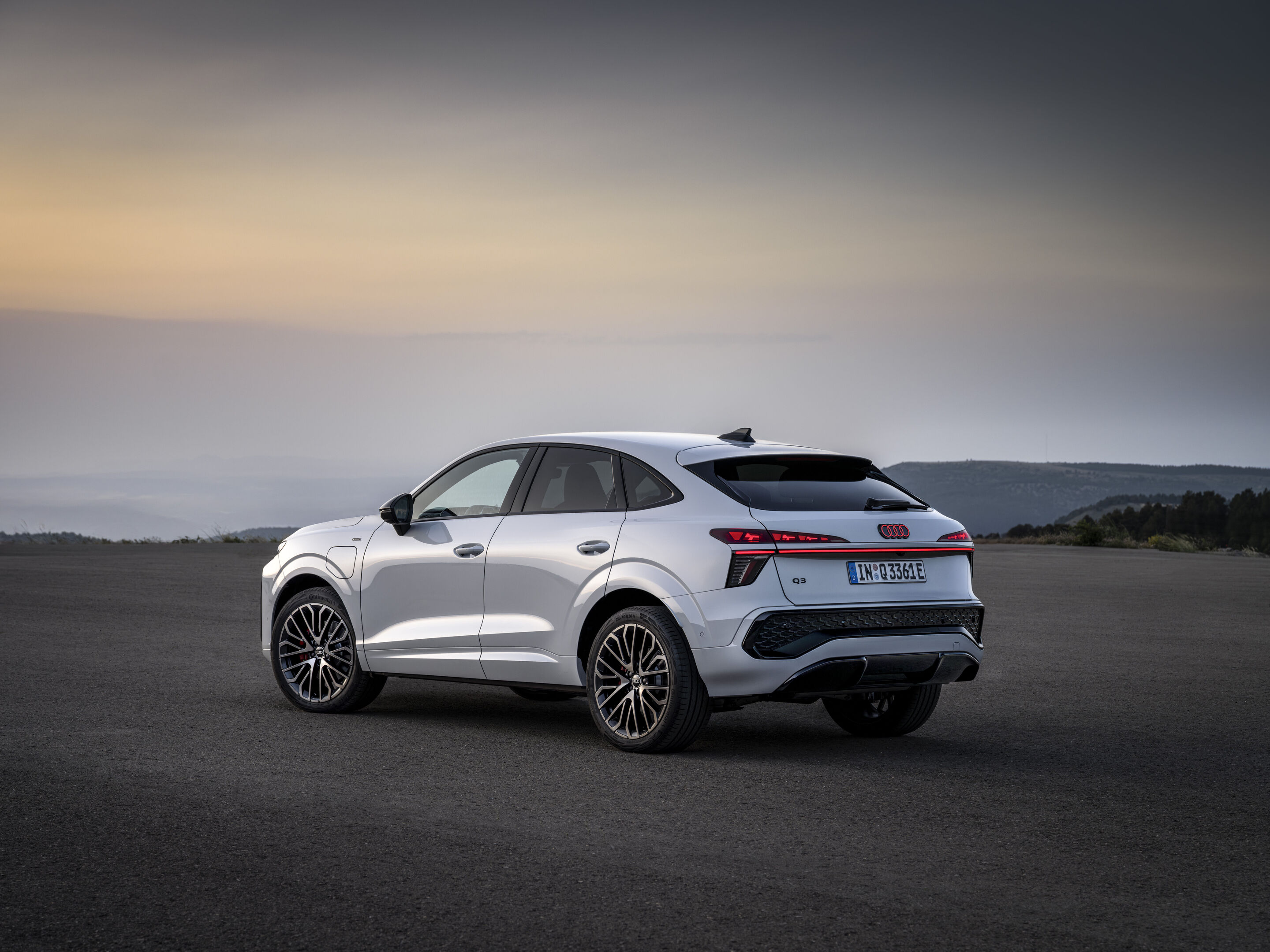 Audi Q3 Sportback e-hybrid - Glacier white metallic, static outdoor shot, exterior, rear three-quarter view