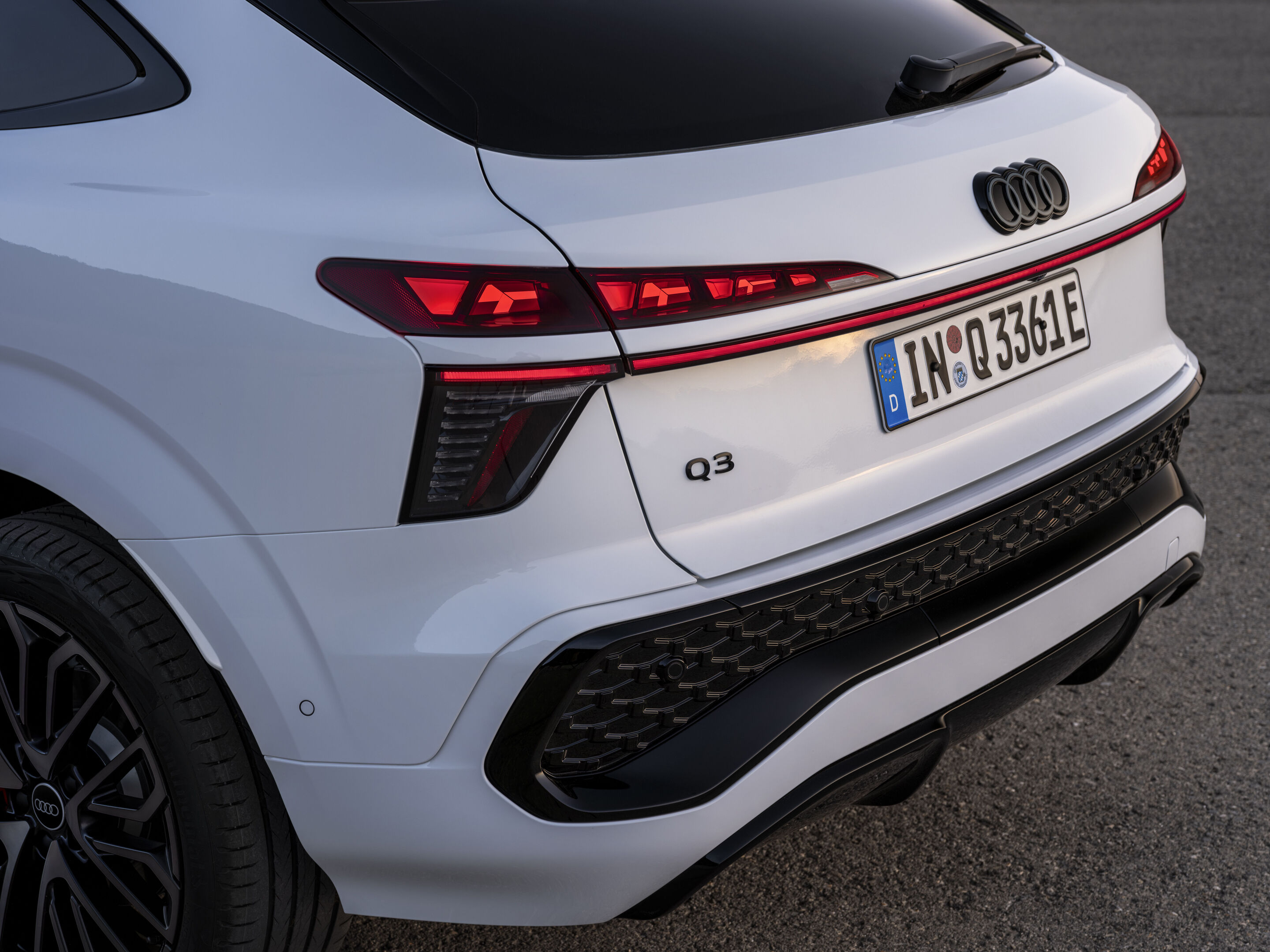 Audi Q3 Sportback e-hybrid - Glacier white metallic, static outdoor shot, exterior, rear detail