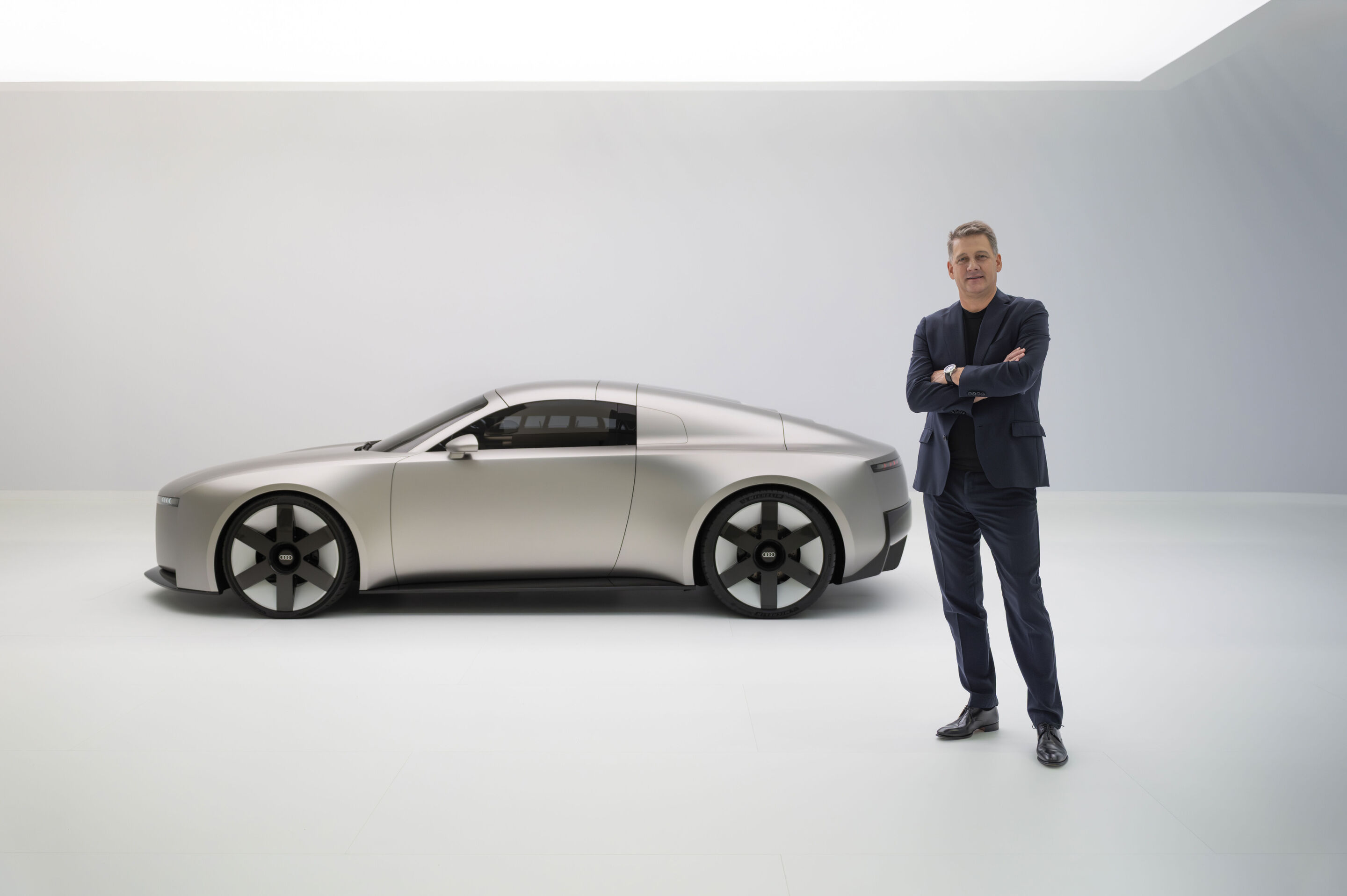 Audi Concept C - Audi CEO Gernot Döllner to the right of the Audi Concept C