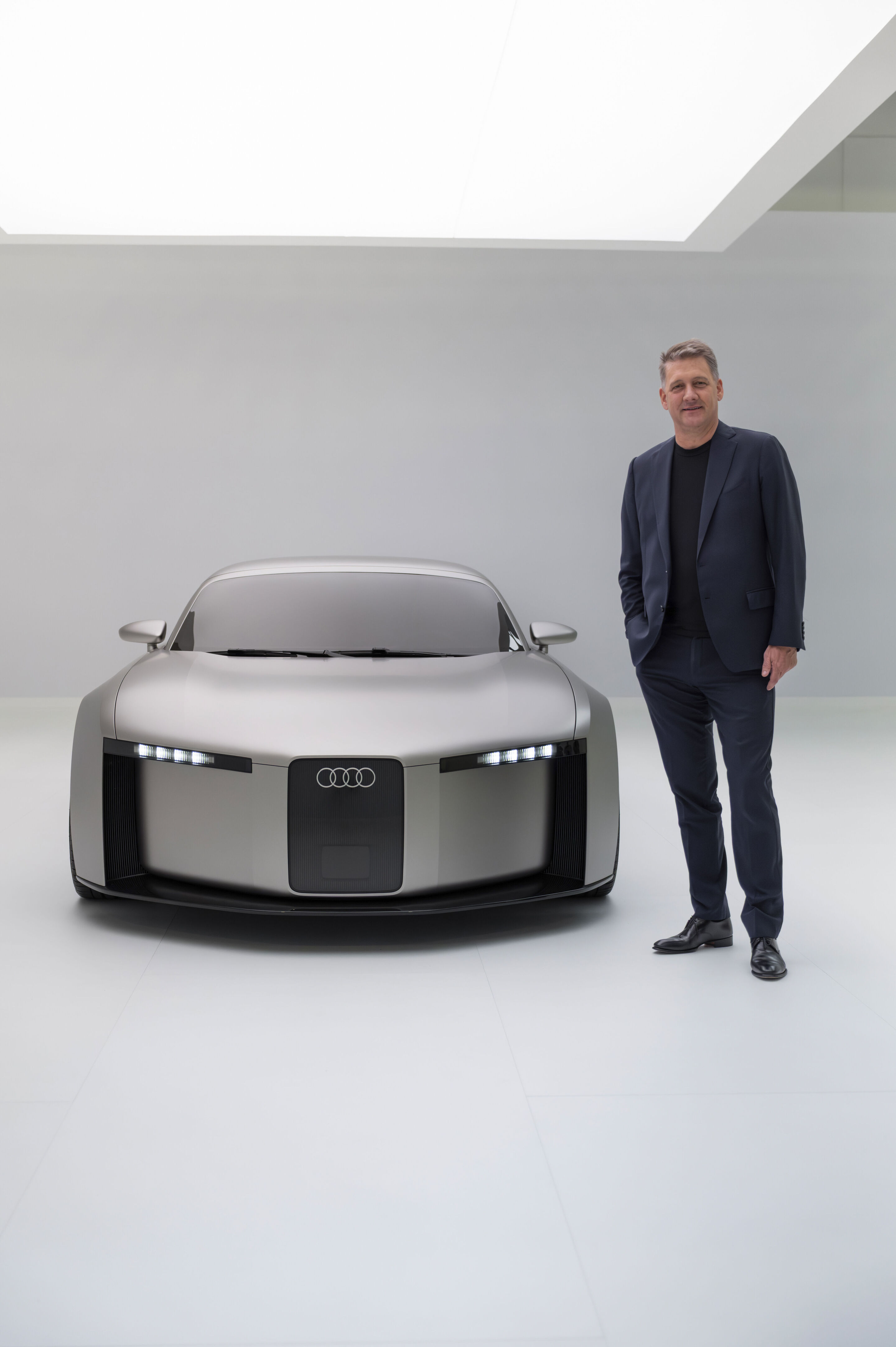 Audi Concept C - Audi CEO Gernot Döllner to the right of the Audi Concept C
