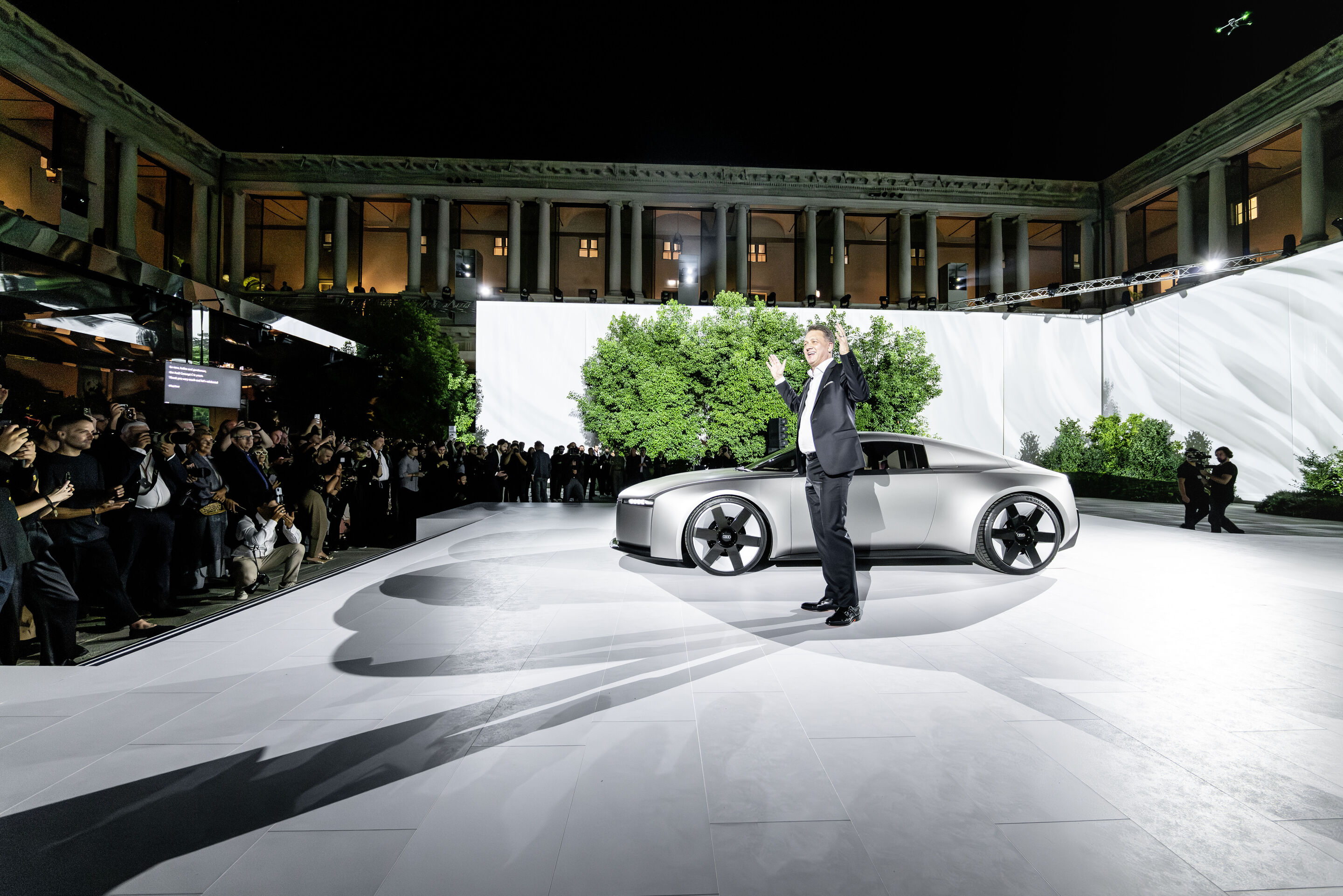 A new beginning in Milan: Audi unveils new design - Audi CEO Gernot Döllner beside the Audi Concept C at the 'Strive for clarity' event on September 2, 2025, in Milan, Italy