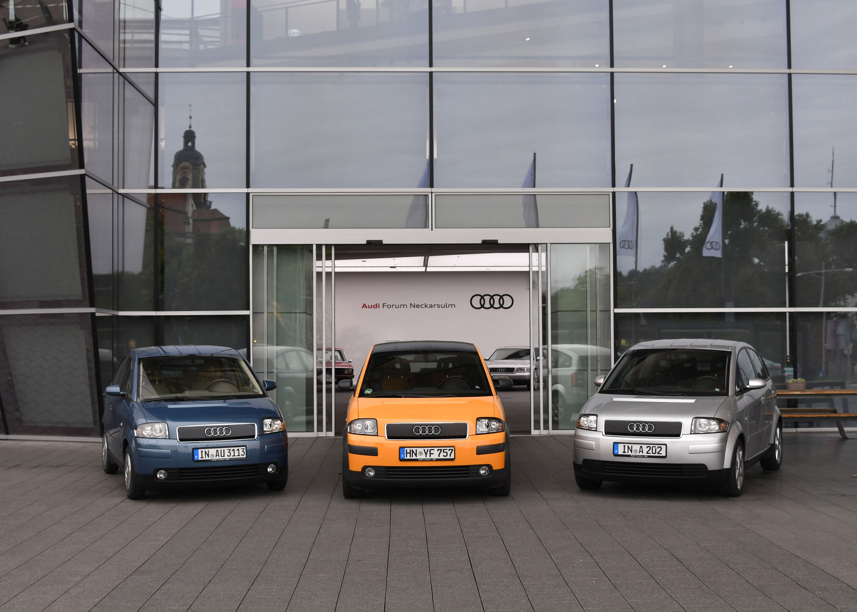 Leading light: the Audi A2 launched 25 years ago - The Audi A2 was launched in 2000 – 25 years ago. The picture shows three A2 models of the historical collection of AUDI AG, shot taken in front of the Audi Forum Neckarsulm.