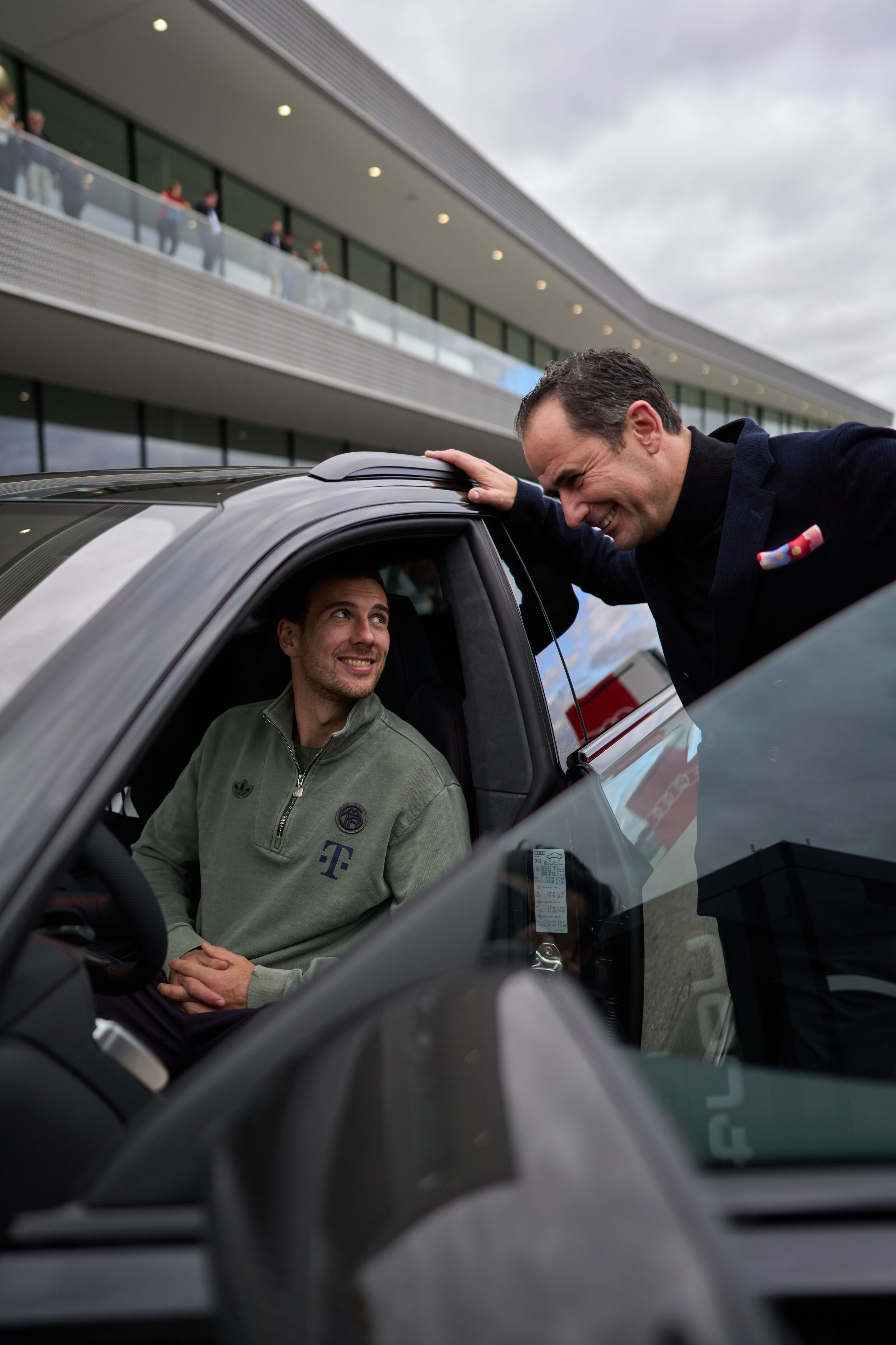 Audi hands over new company cars to FC Bayern Munich - German national team player Leon Goretzka and AUDI AG Board Member for Sales and Marketing Marco Schubert during the vehicle handover to FC Bayern Munich.