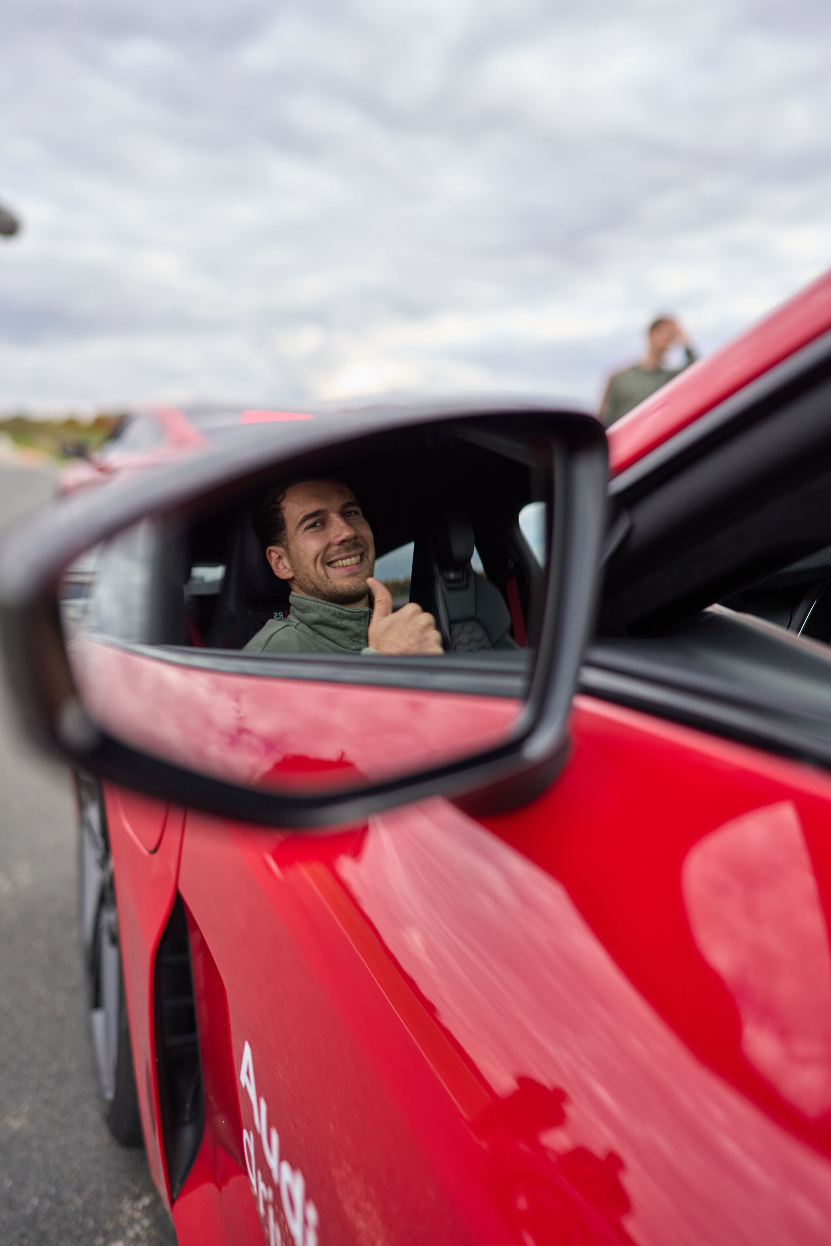 Audi hands over new company cars to FC Bayern Munich - Audi driving experience: Leon Goretzka in the Audi RS e-tron GT performance.