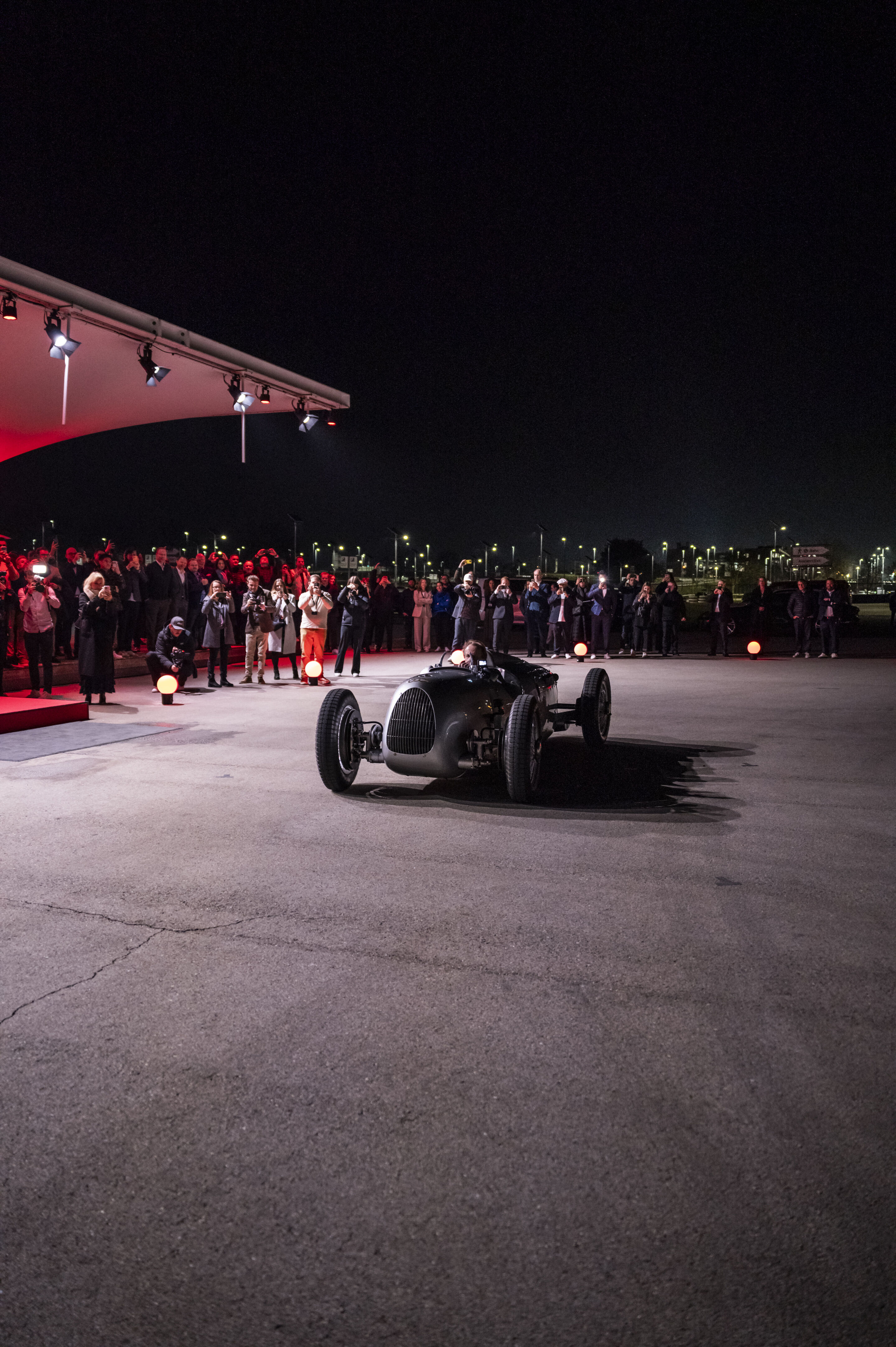 Motorsport legends welcome the Audi R26 Concept - Audi driver legends are guests at the event “Audi One” in Munich, November 12, 2025: Frank Biela in the Auto Union Typ C