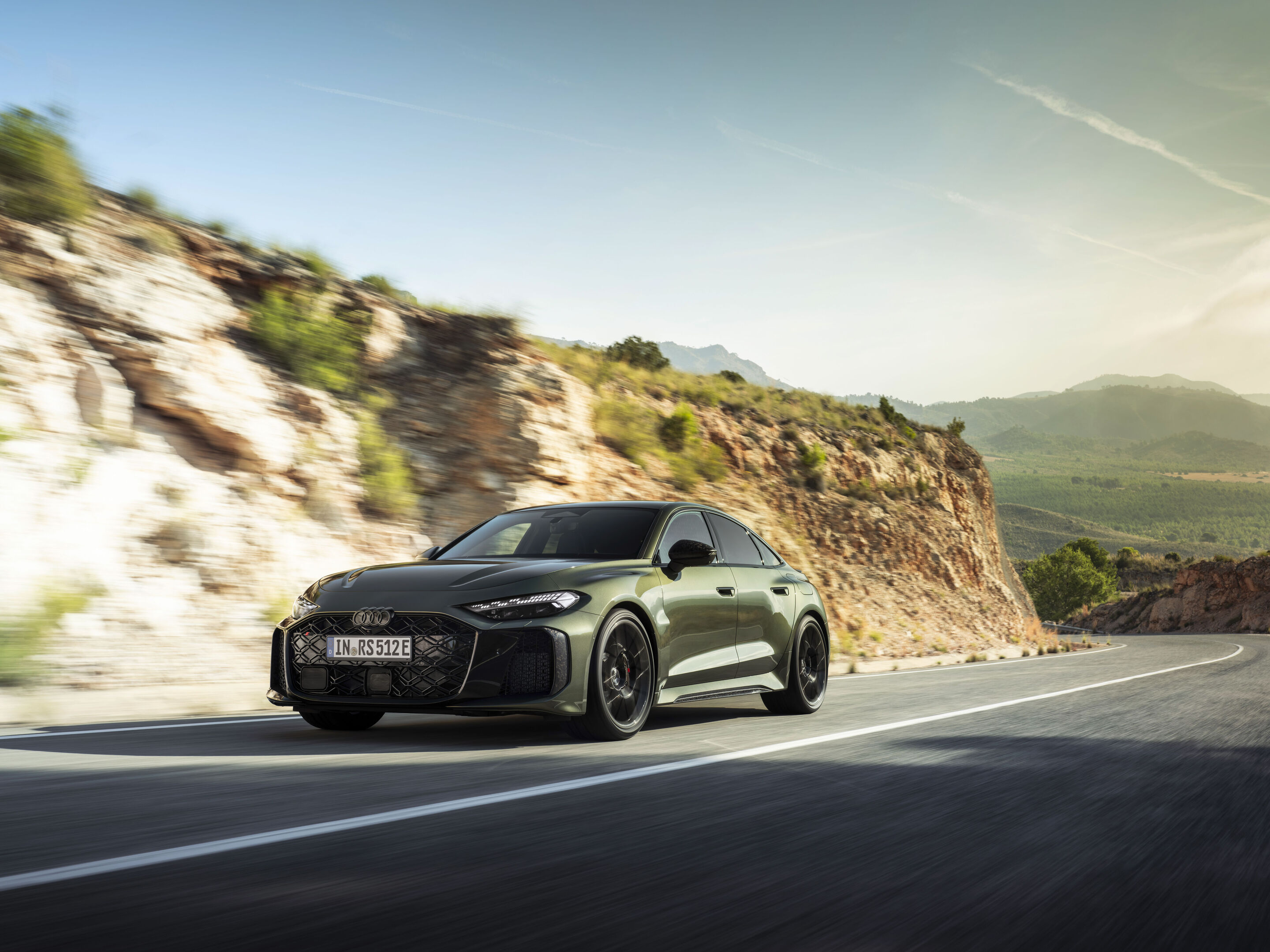 Audi RS 5 Sedan - Bedford green metallic, outdoor dynamic photo, exterior, three-quarter front view