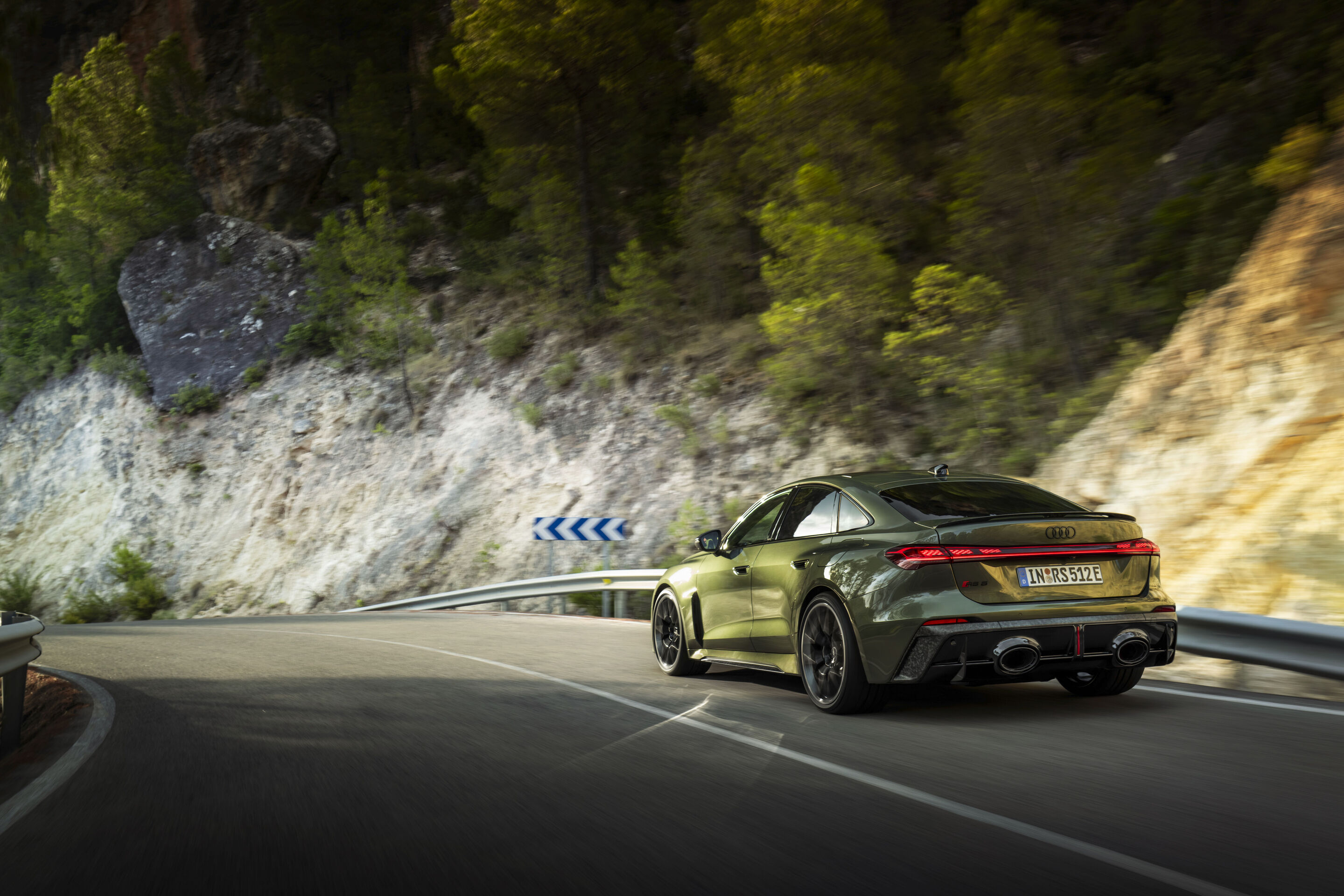 Audi RS 5 Sedan - Bedford green metallic, outdoor dynamic photo, exterior, three-quarter rear view