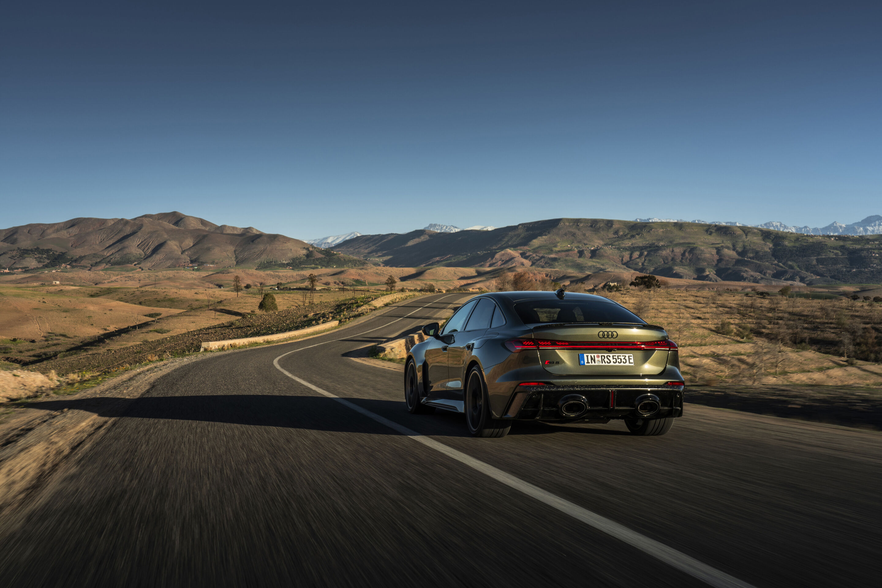 Audi RS 5 Sedan - The Audi RS 5 Sedan in Bedford green on an open road in the Atlas Mountains: confident acceleration and high stability.