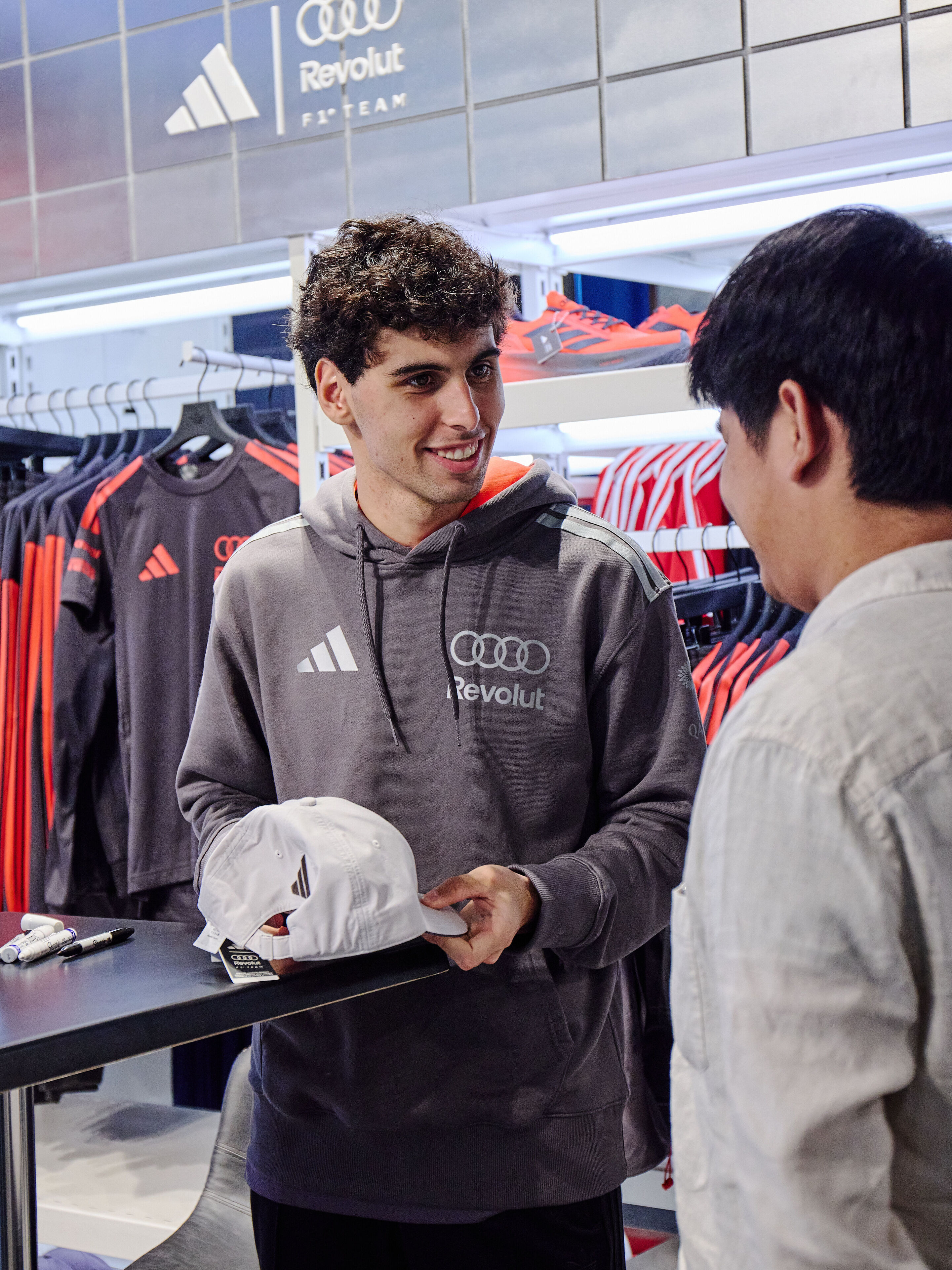 Audi makes its Formula 1 debut - Gabriel Bortoleto visits the Adidas Original Store downtown Melbourne.