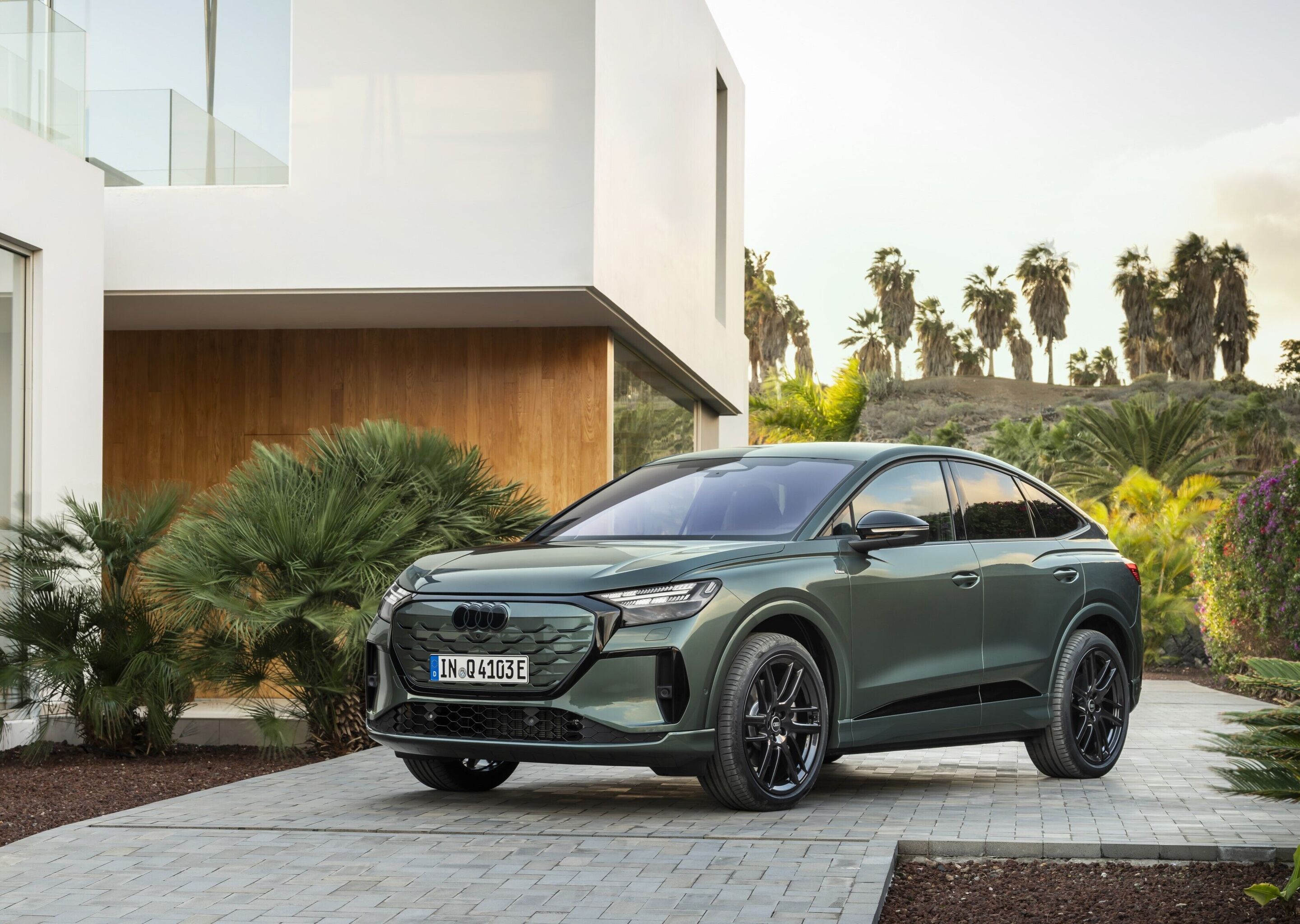 Audi Q4 Sportback e-tron - Sage green metallic, outdoor static photo, exterior, three-quarter front view