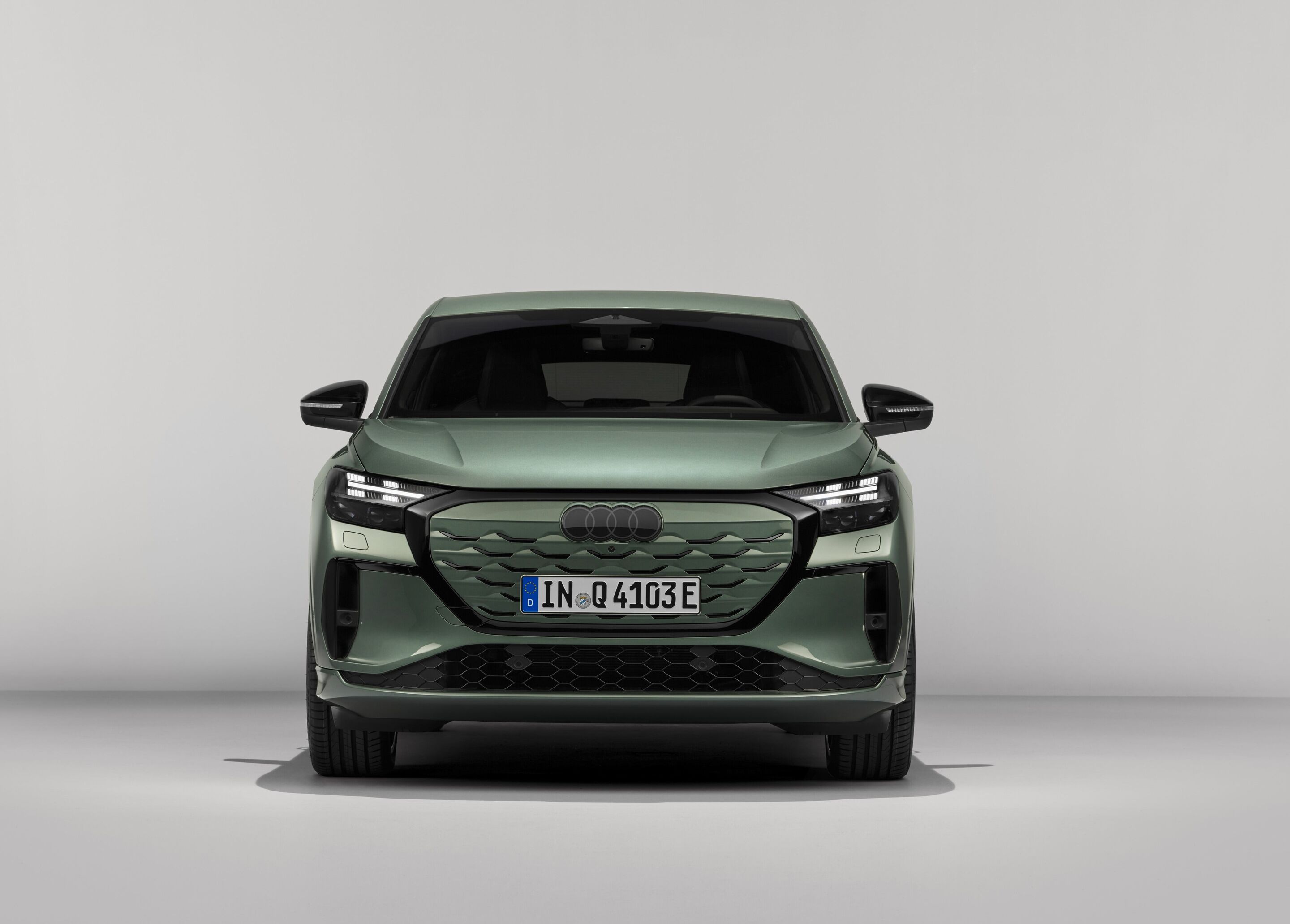 Audi Q4 Sportback e-tron - Sage green metallic, studio static photo, exterior, front view
