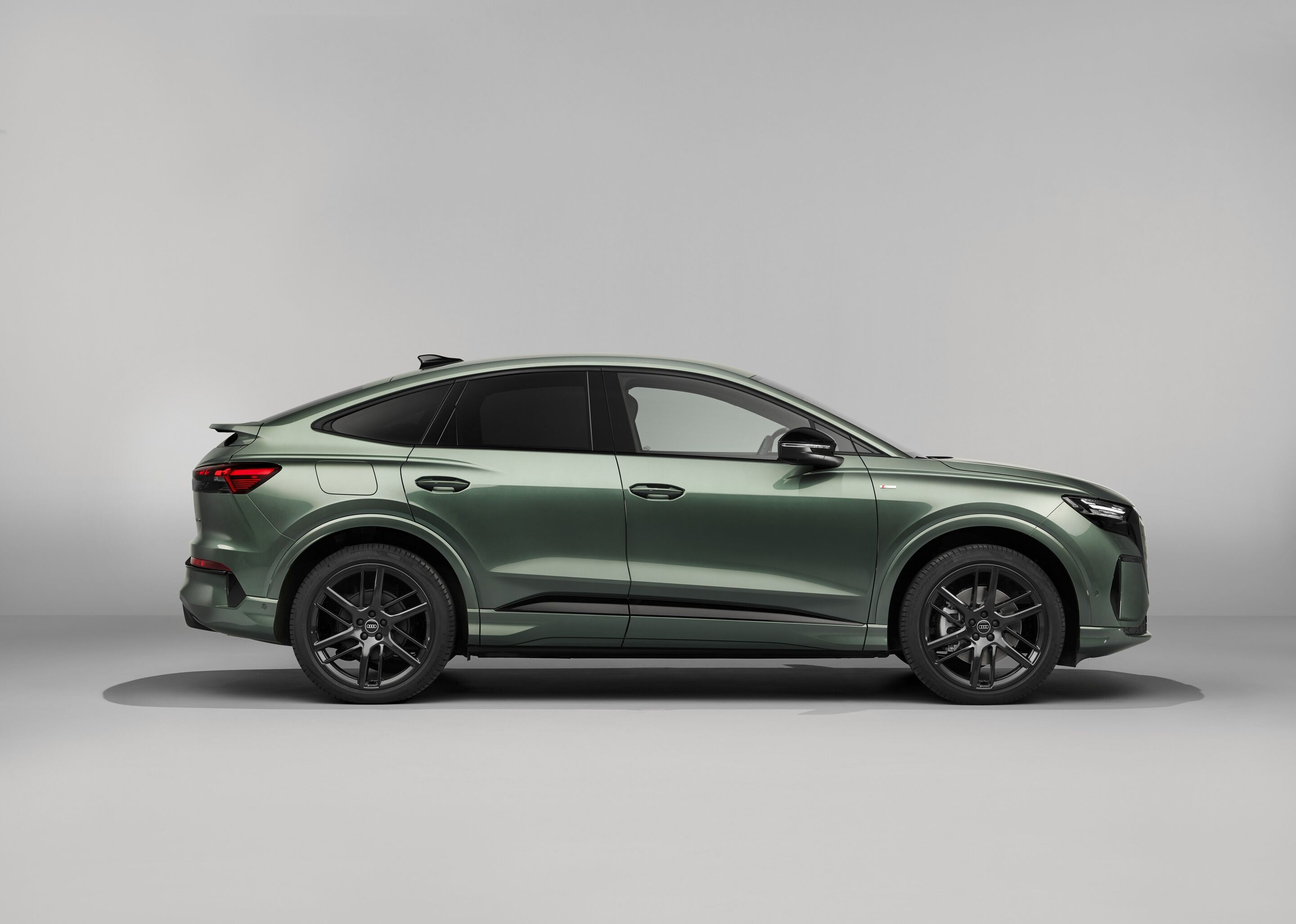 Audi Q4 Sportback e-tron - Sage green metallic, studio static photo, exterior, side view