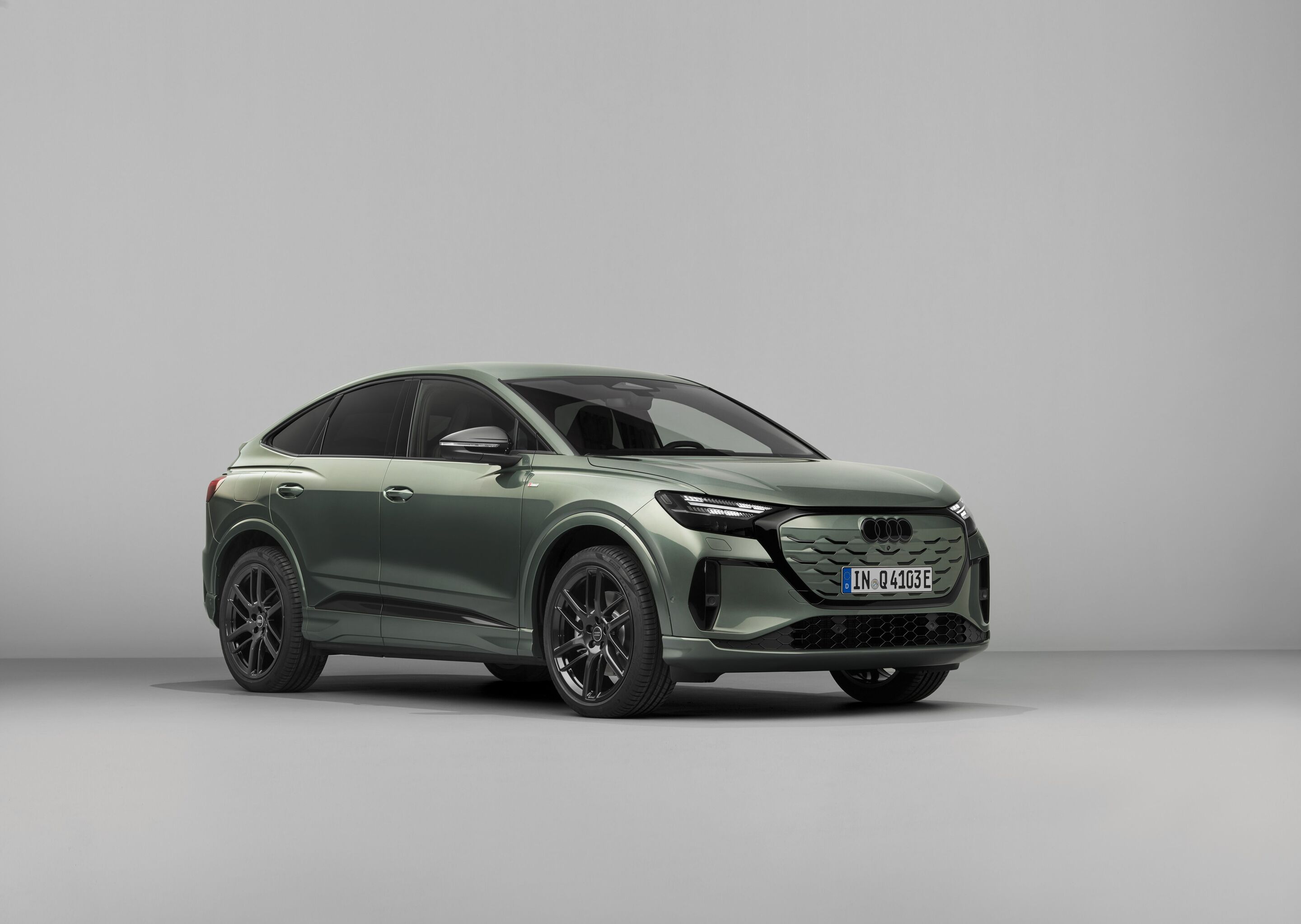 Audi Q4 Sportback e-tron - Sage green metallic, studio static photo, exterior, three-quarter front view
