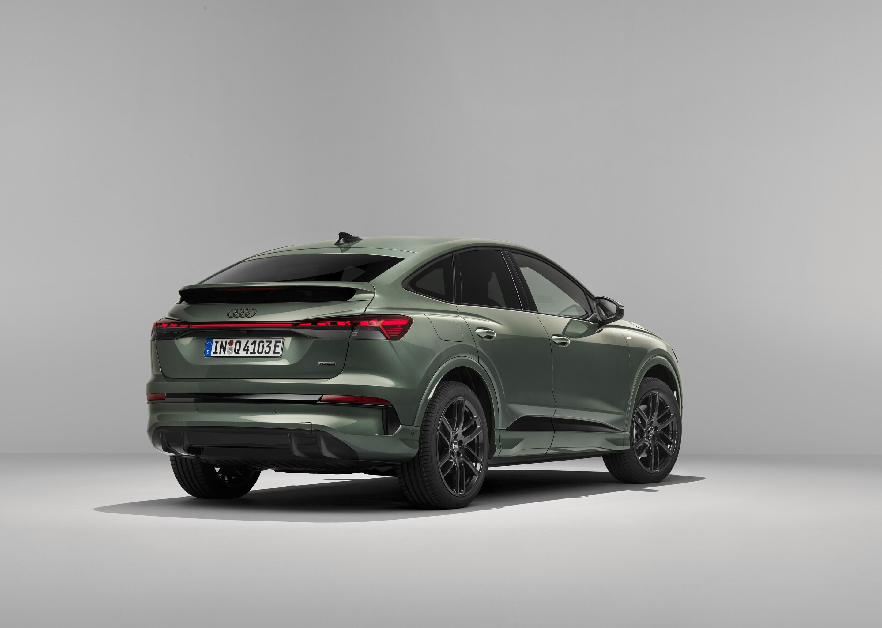 Audi Q4 Sportback e-tron - Sage green metallic, studio static photo, exterior, three-quarter rear view