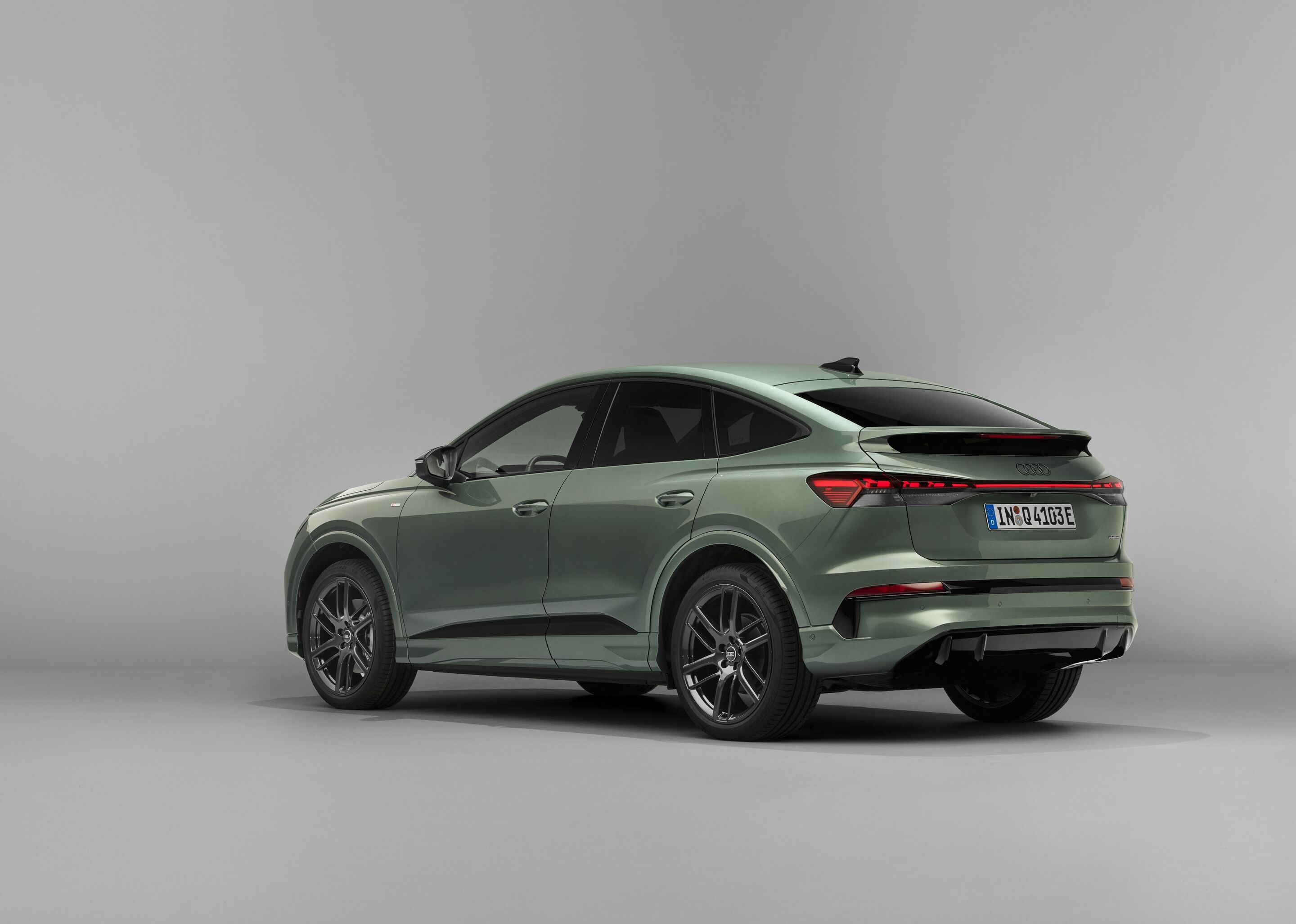 Audi Q4 Sportback e-tron - Sage green metallic, studio static photo, exterior, three-quarter rear view