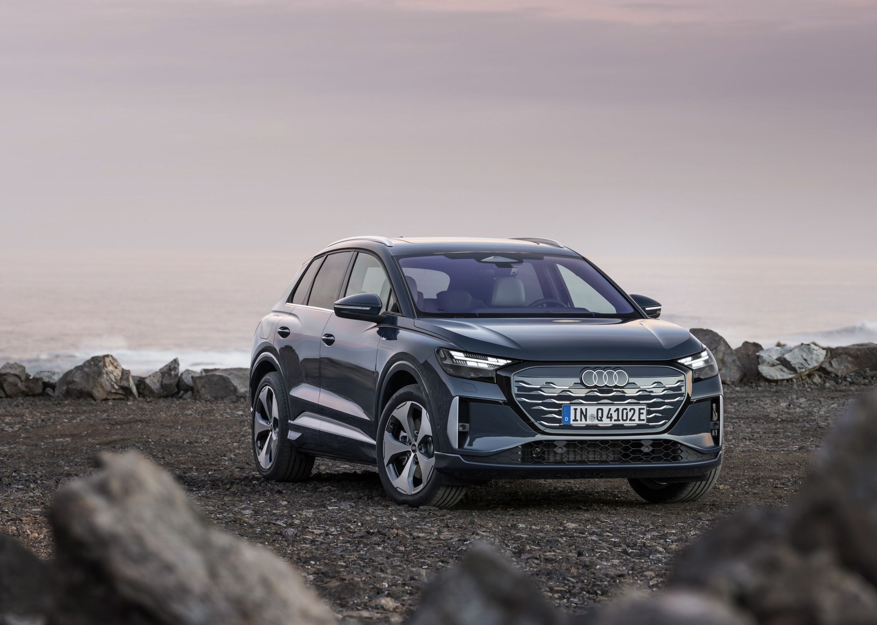Audi Q4 SUV e-tron - Lavender gray, outdoor static photo, exterior, three-quarter front view