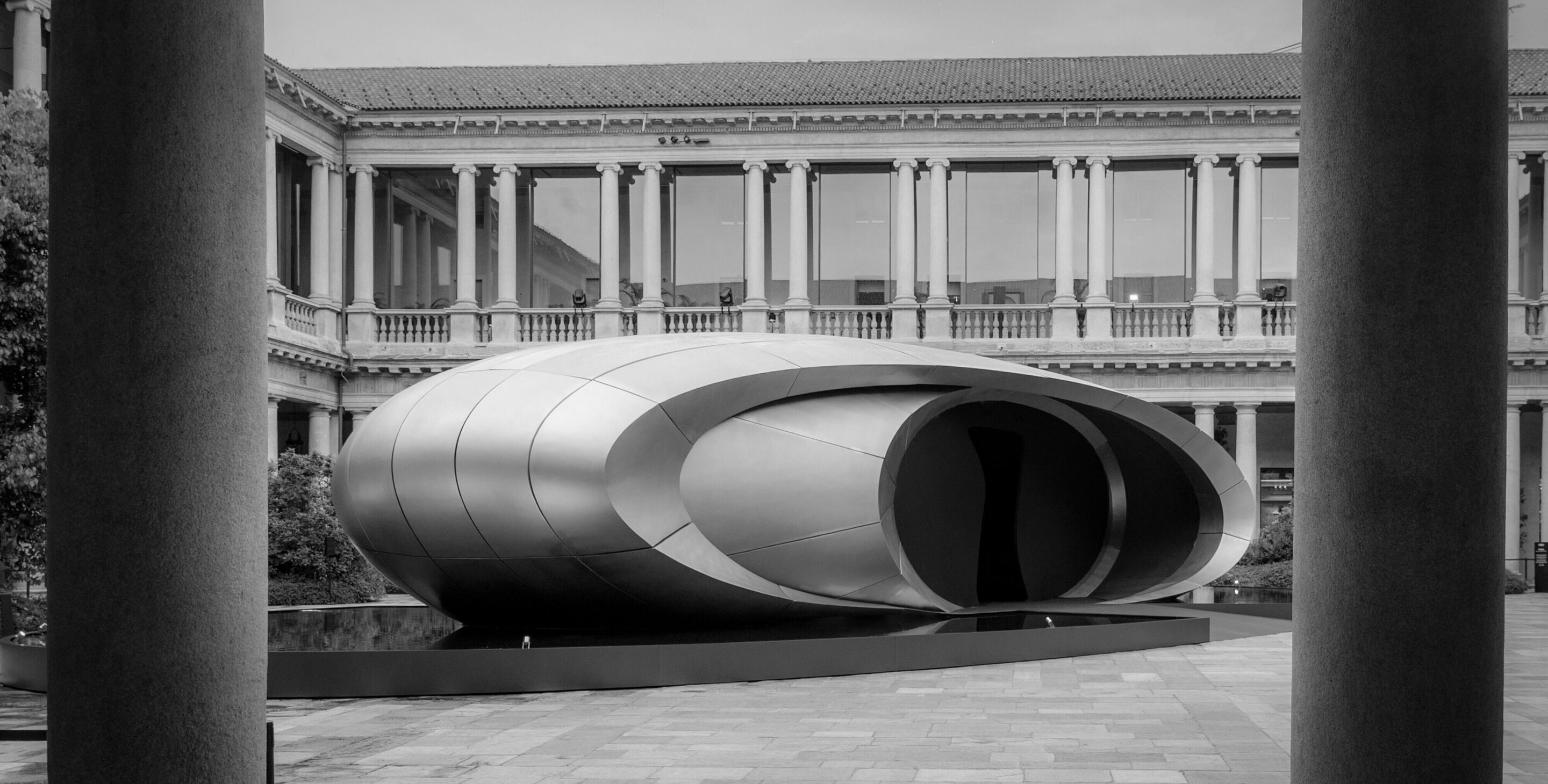 Audi at Milan Design Week 2026 - Audi’s installation “Origin” in the courtyard of the former Archiepiscopal Seminary in Milan. Developed in collaboration with Zaha Hadid Architects, the sculptural structure translates Audi’s design philosophy – clarity,...