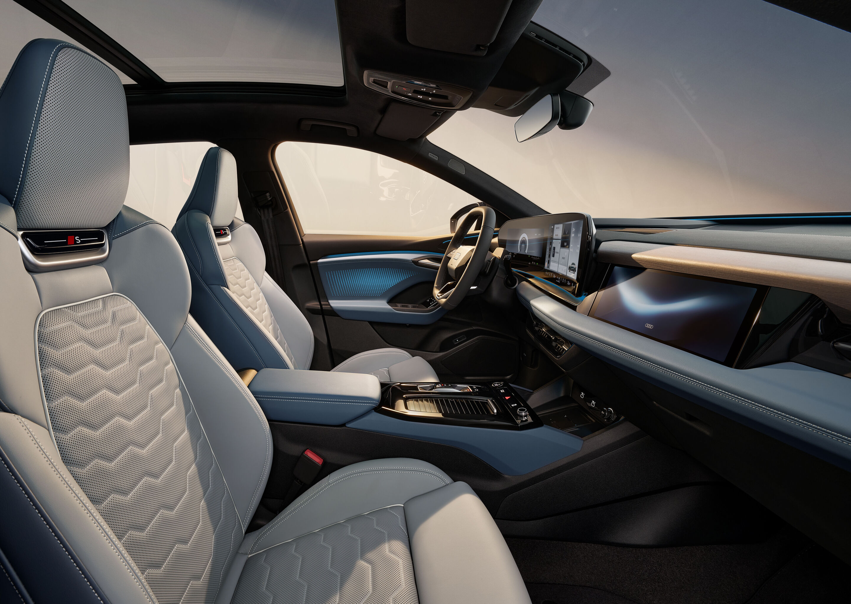 Audi at Auto China 2026 - Studio shot, interior of the Audi Q6L e-tron, focus on front seats, center console and MMI panoramic display