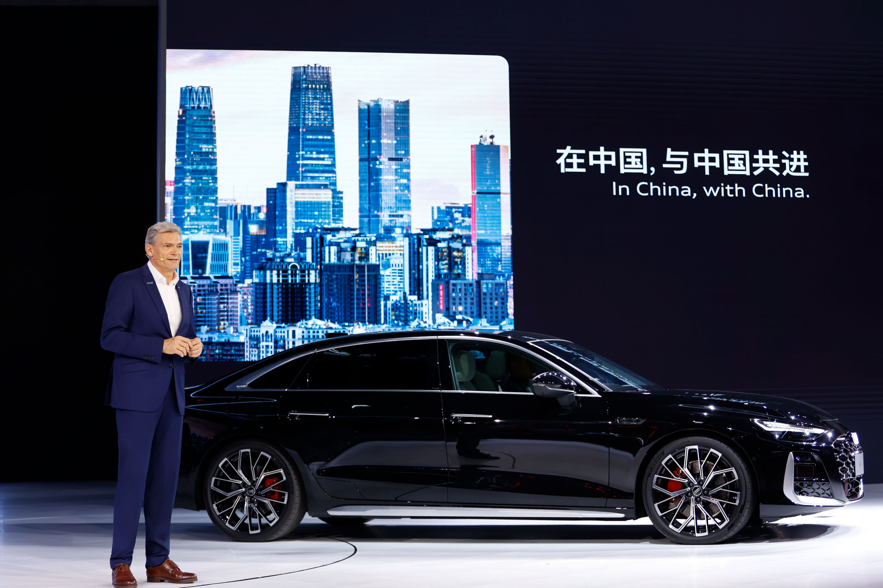 Audi at Auto China 2026 - Johannes Roscheck, President of Audi China, with the Audi A6L.