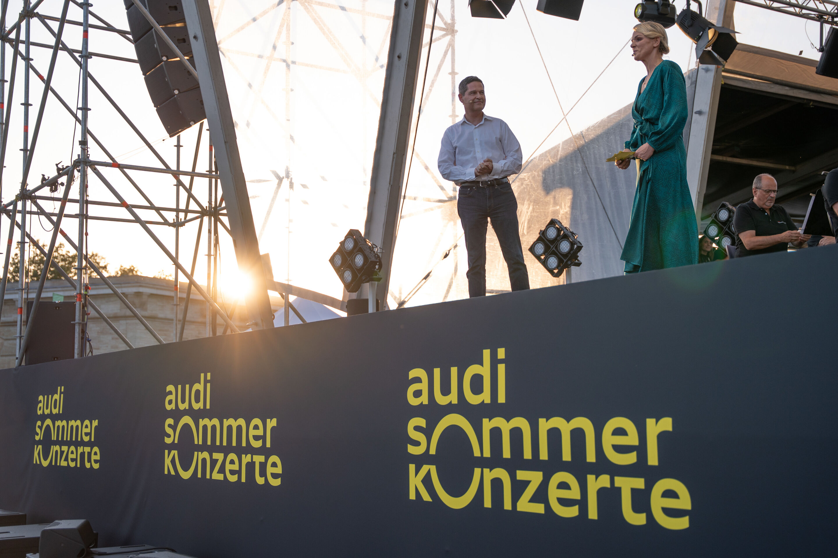 The Audi Wind Orchestra at the opening concert/classical open-air concert in Klenzepark - At the Classical Open-Air Concert 2026 in Klenzepark, featuring the Audi Wind Philharmonic as part of the Audi Summer Concerts, Xavier Ros, Member of the Board of...
