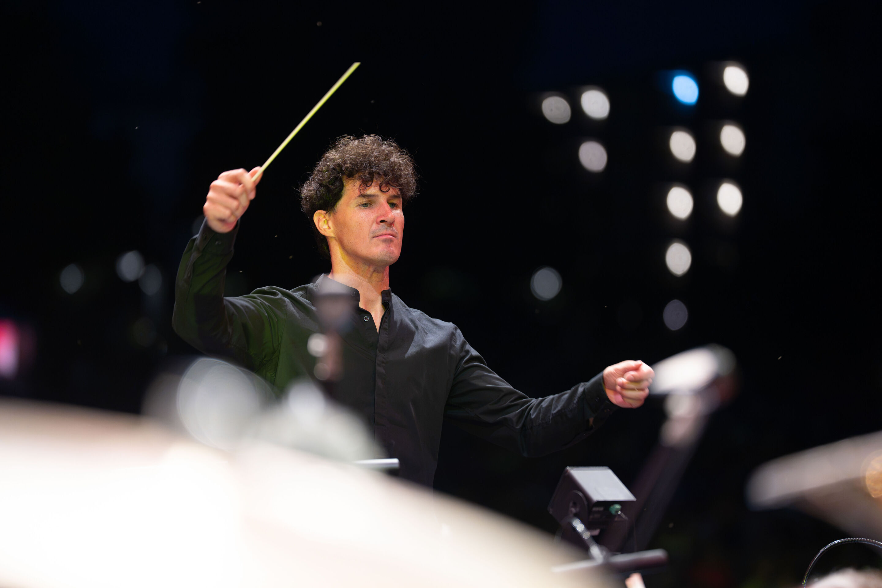 The Audi Wind Orchestra at the opening concert/classical open-air concert in Klenzepark - Conductor Mathias Wehr leads the Audi Wind Philharmonic at the opening open-air concert of the 2026 Audi Summer Concerts in Klenzepark.