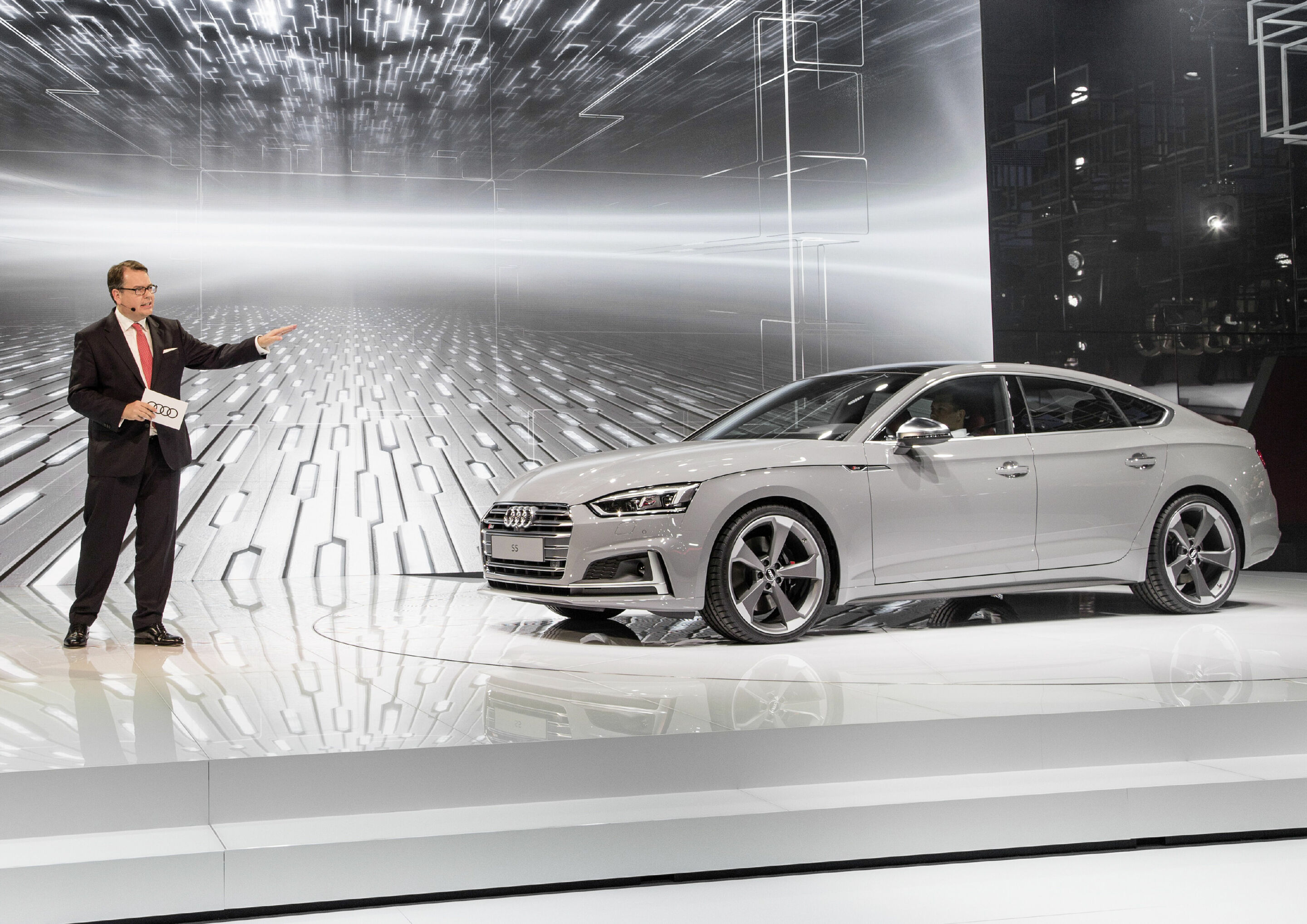Dr. Dietmar Voggenreiter (Member of the Board of Management of AUDI AG for Sales and Marketing) in front of the new Audi S5 Sportback at the Paris Motor Show 2016