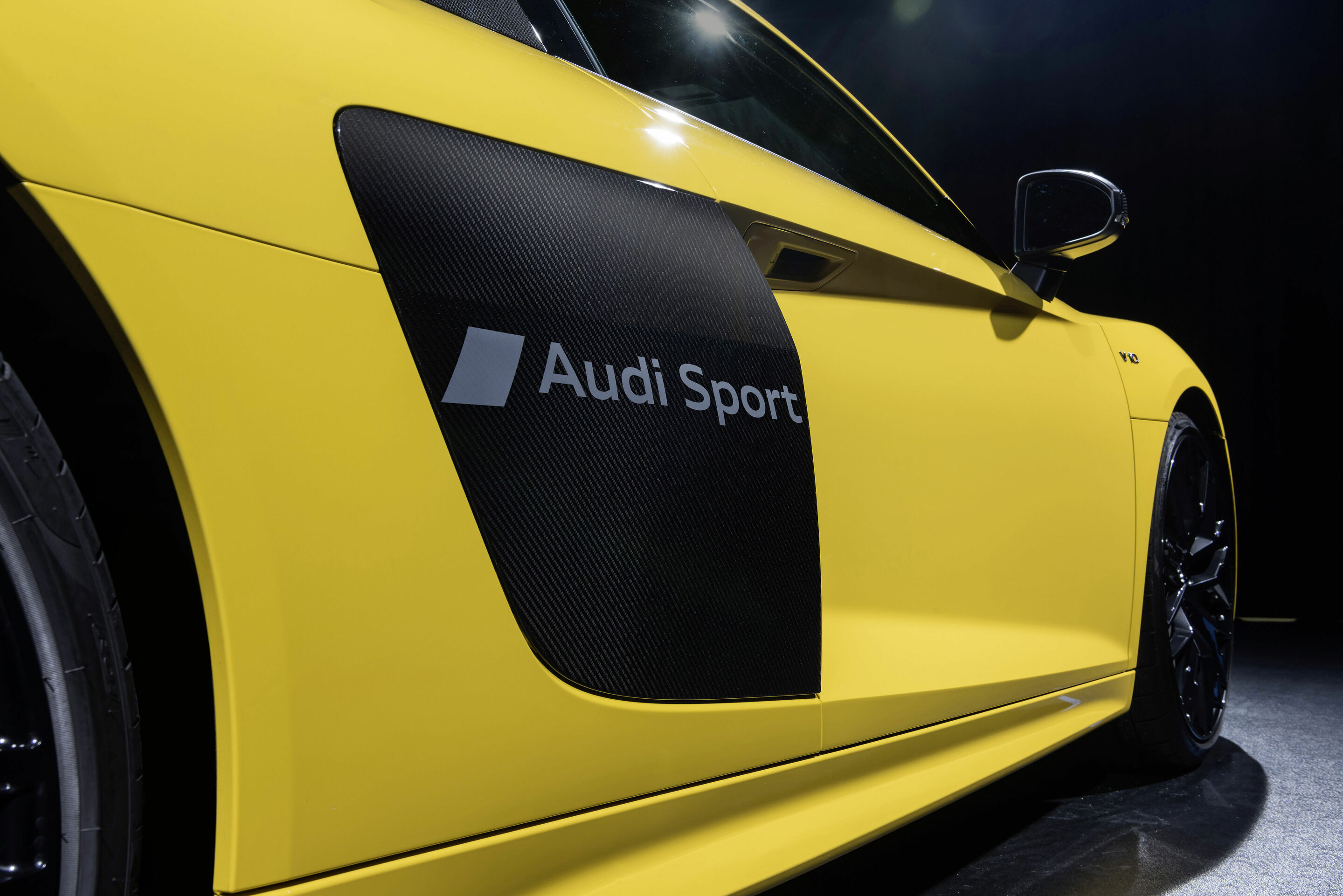 Audi prägt Symbole in den Autolack
