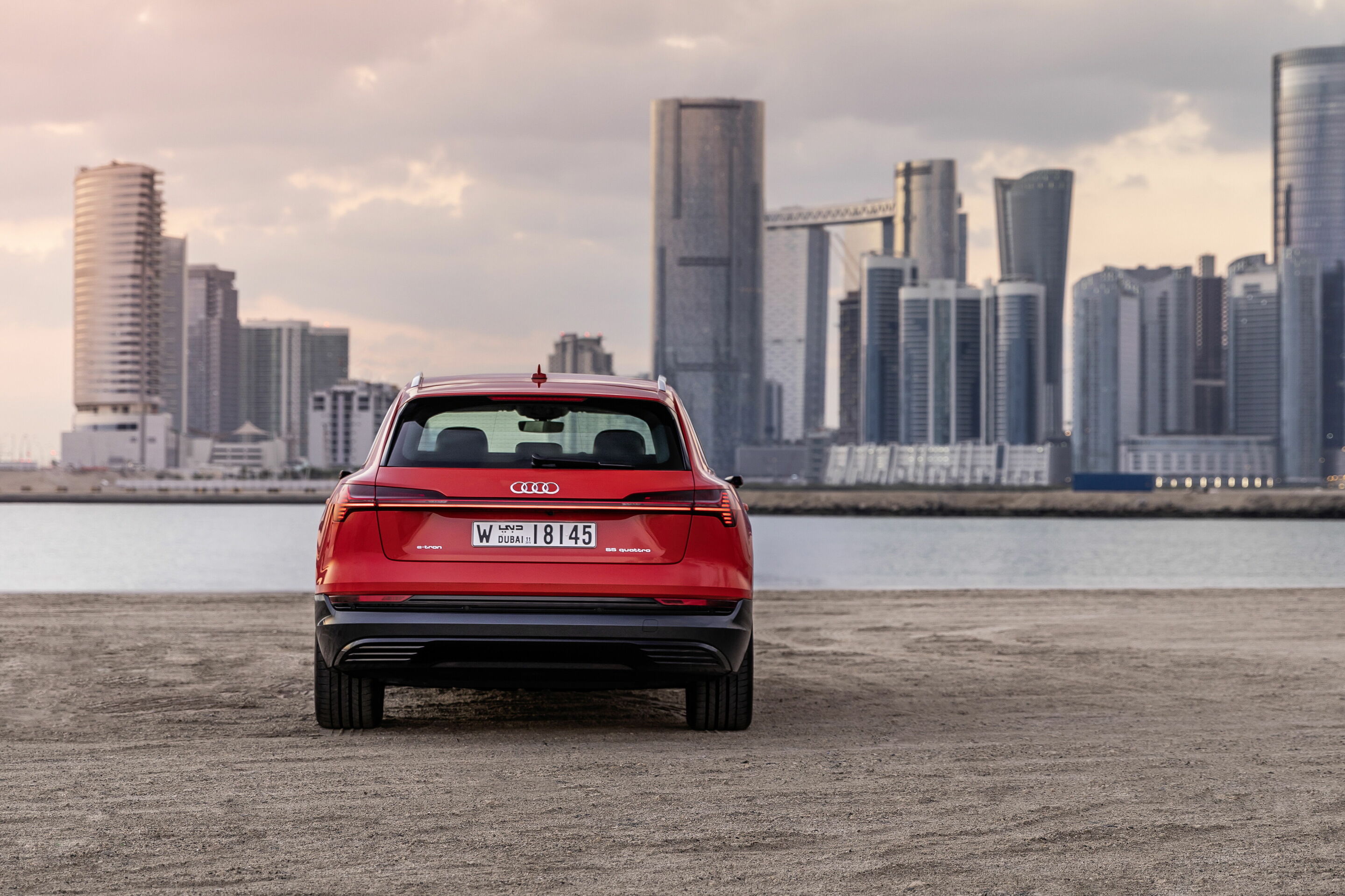 The Audi e-tron at Masdar City - The Audi e-tron in Abu Dhabi,
Static photo, 
Color: Catalunya Red